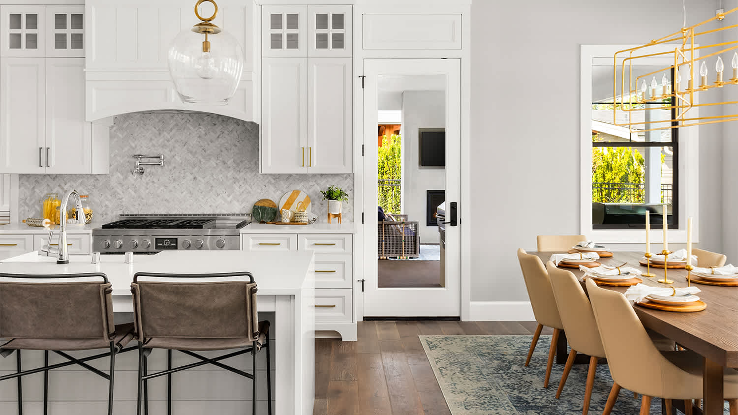 luxury home with kitchen and dining space