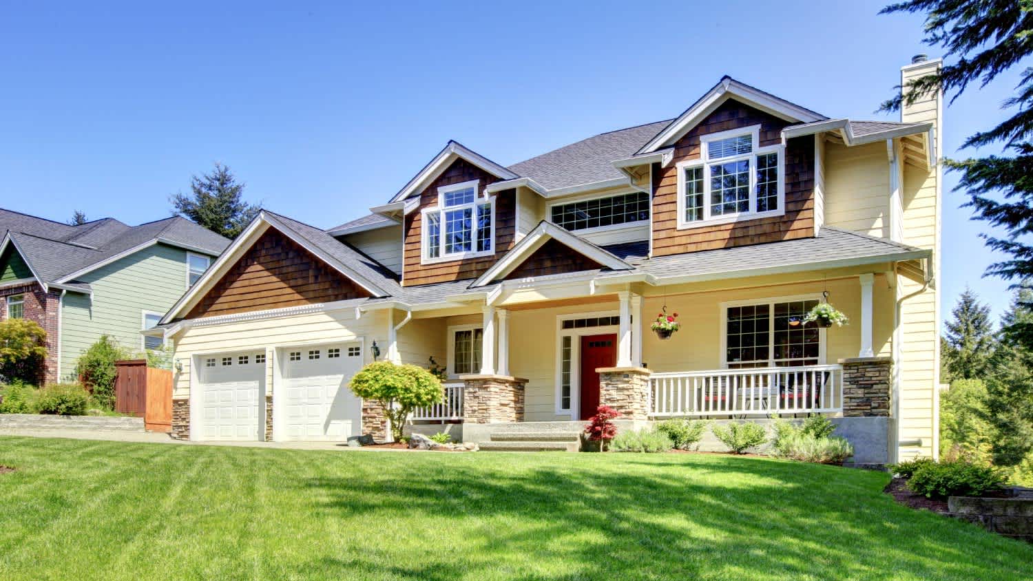 Large American beautiful house with red door