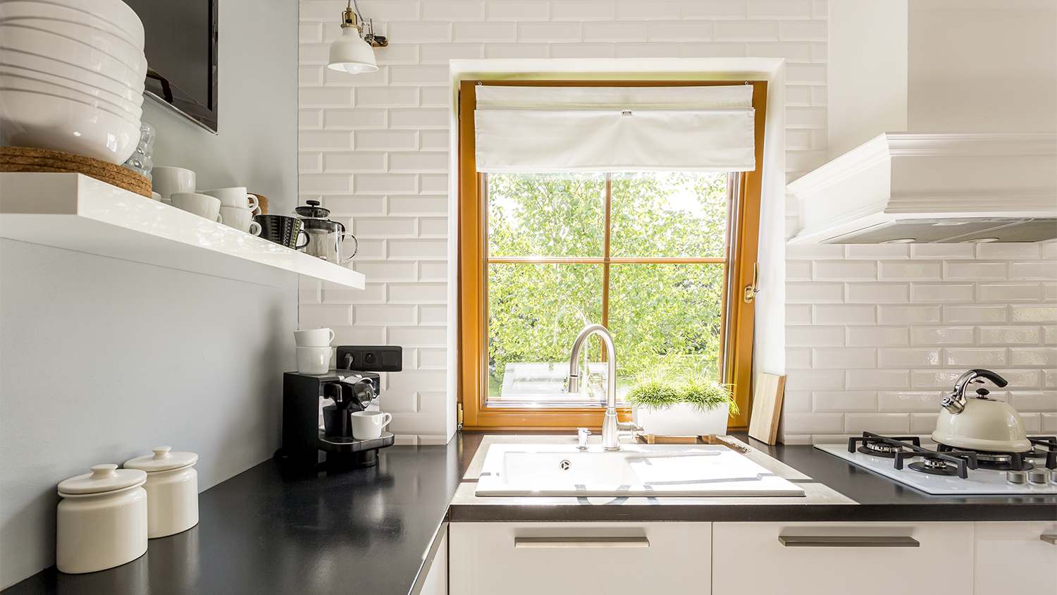 white brick kitchen with coffee essentials