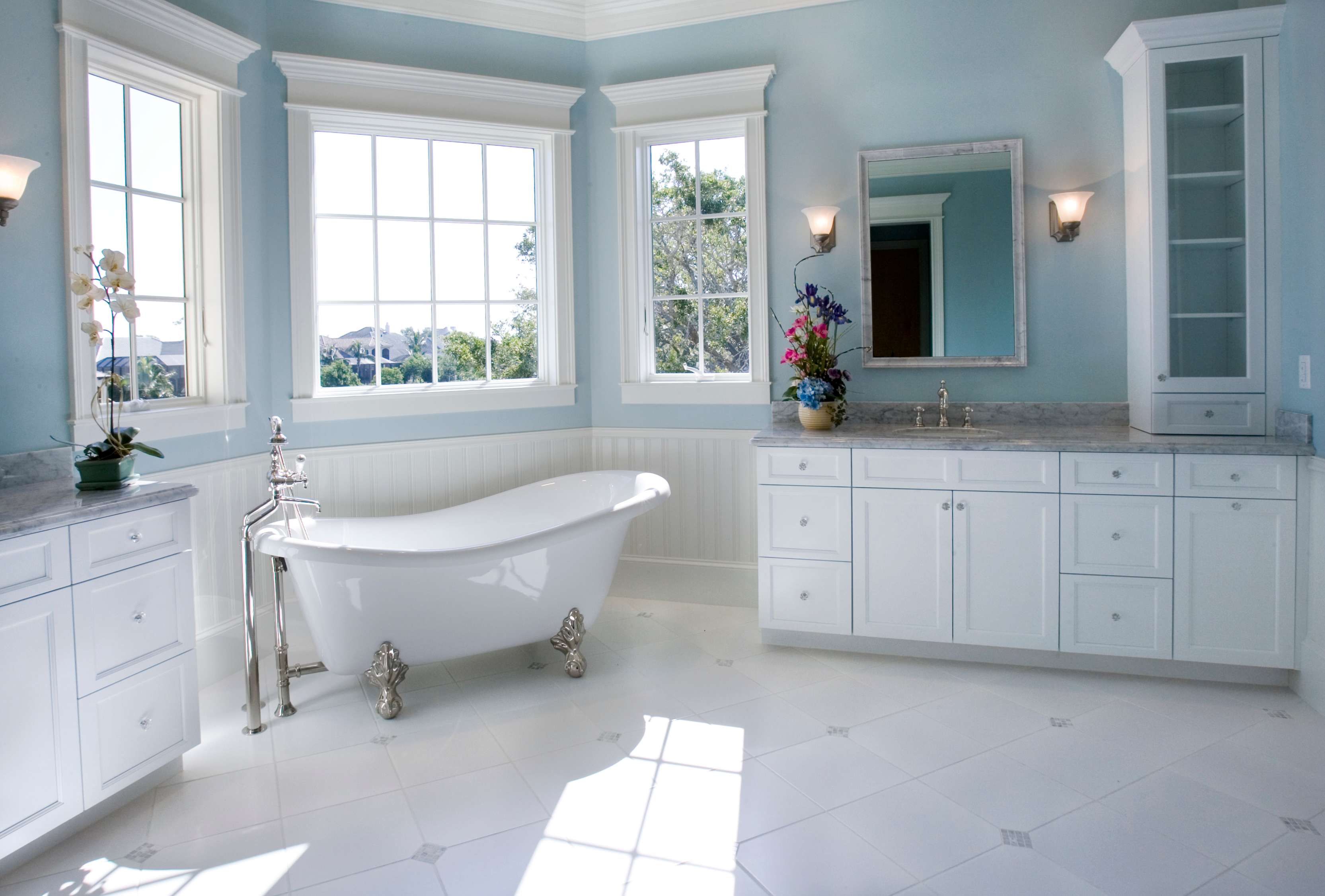 Rustic white and baby blue bathroom with freestanding tub and double vanity