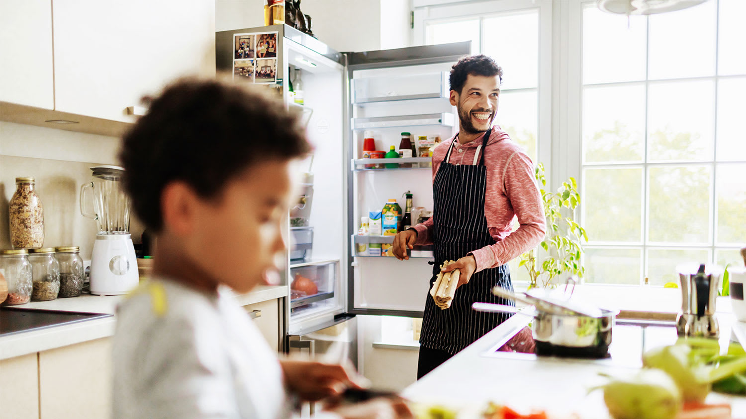 Father and son in kitchen