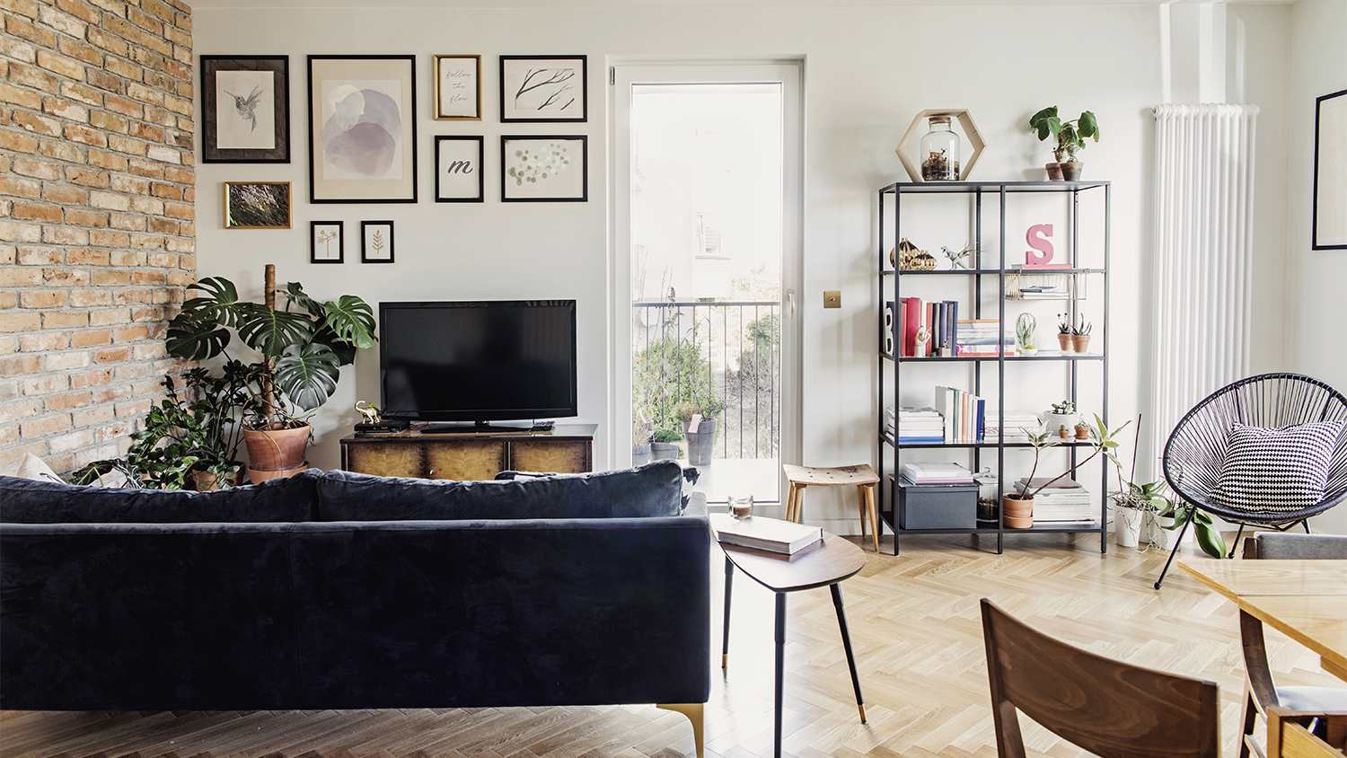 living room with gallery wall and tv