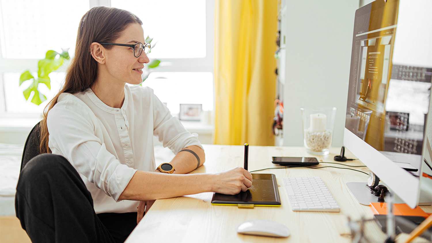 woman on computer in home office