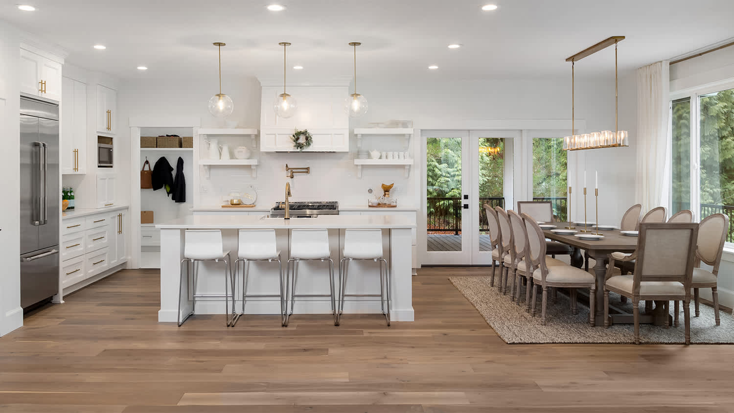 luxury kitchen area with wood flooring