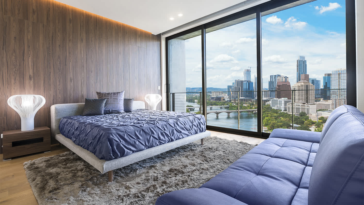 modern condo bedroom with city view