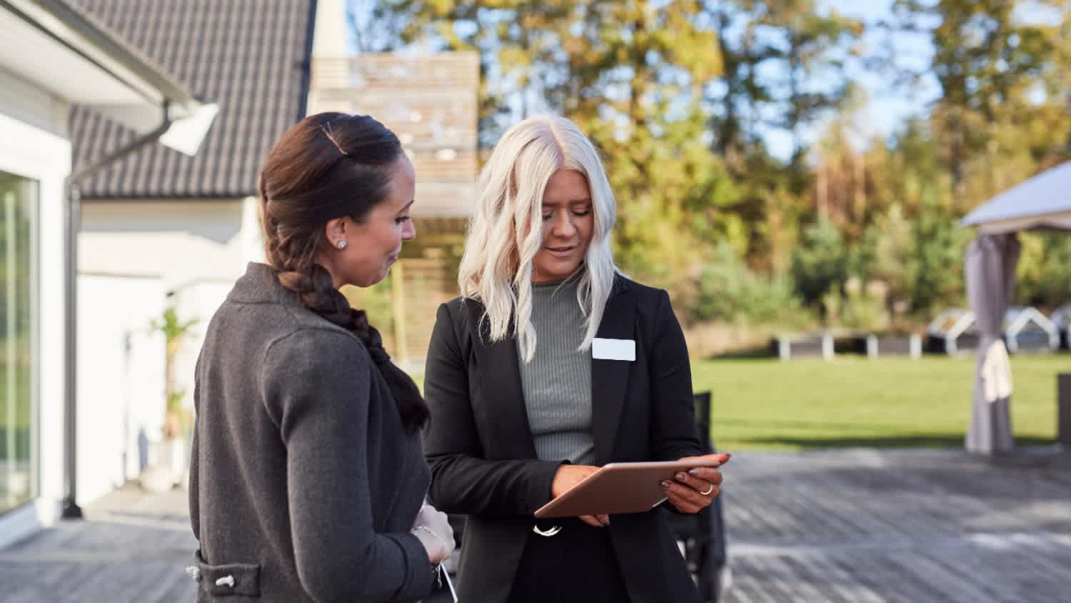 real estate agent talking to buyer about home