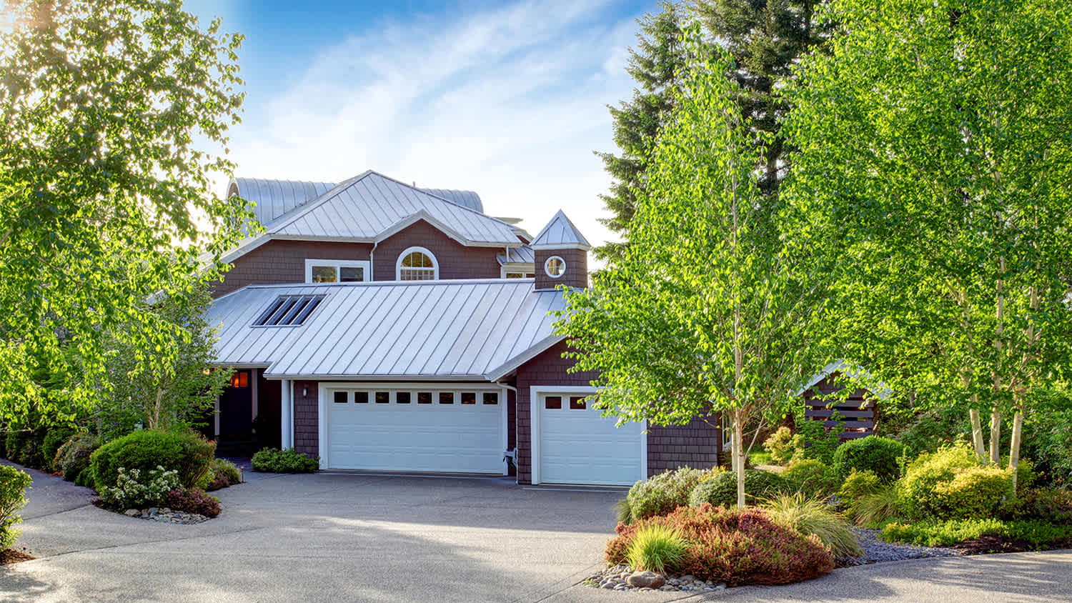 large house surrounded by trees