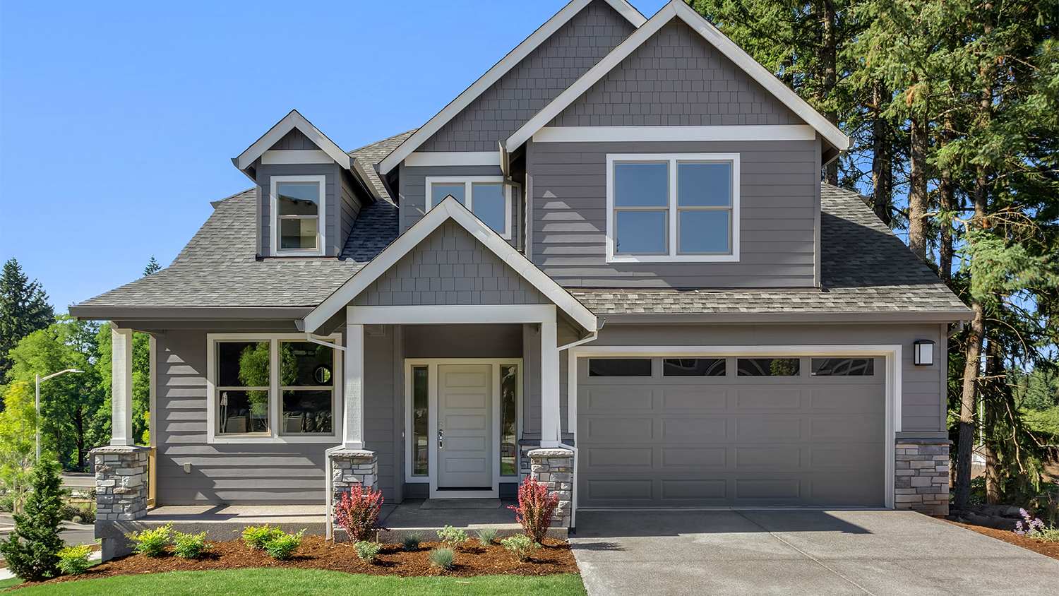 grey suburban house with porch