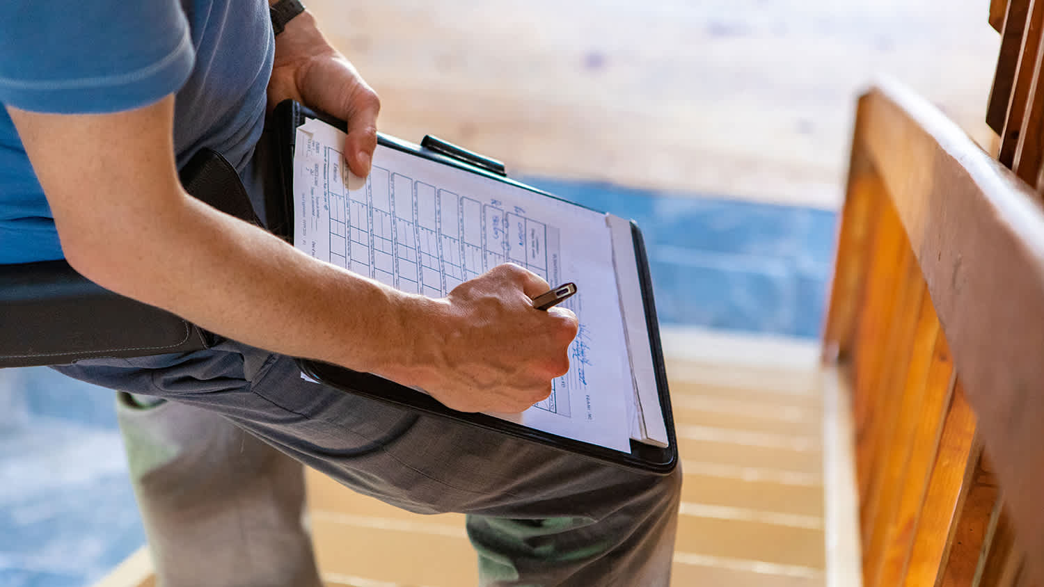 inspector filling out forms for home