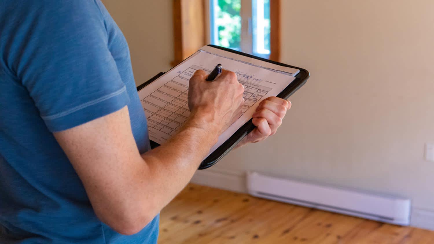 man doing a home inspection