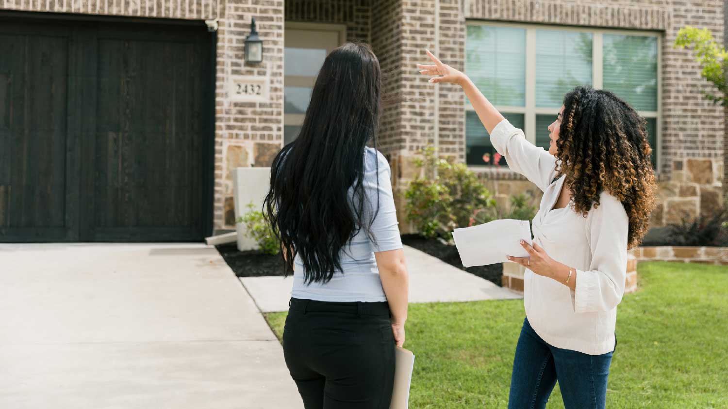 A woman buying a house