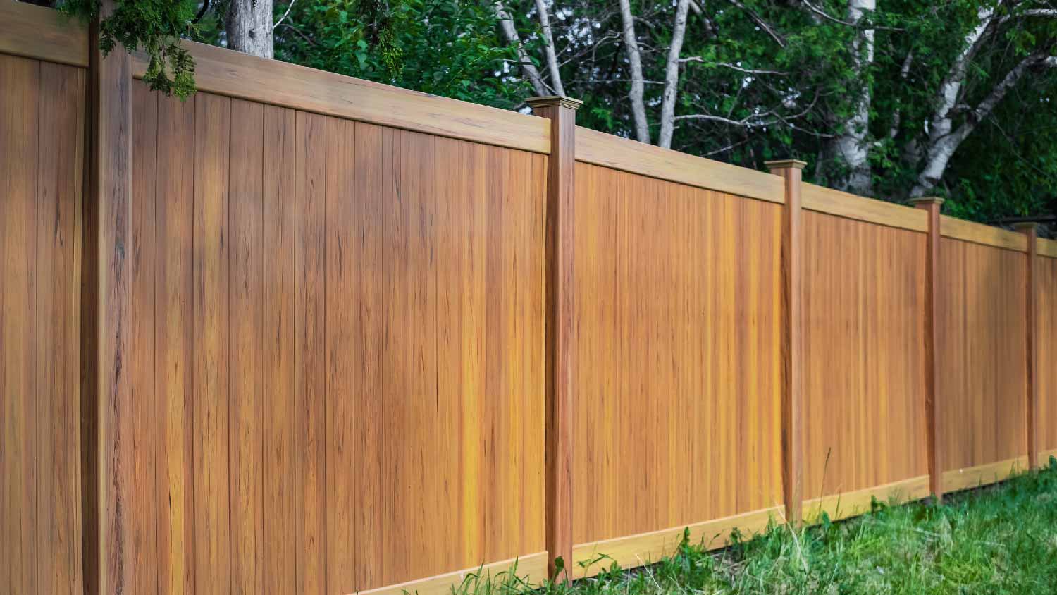 A board-on-board fence