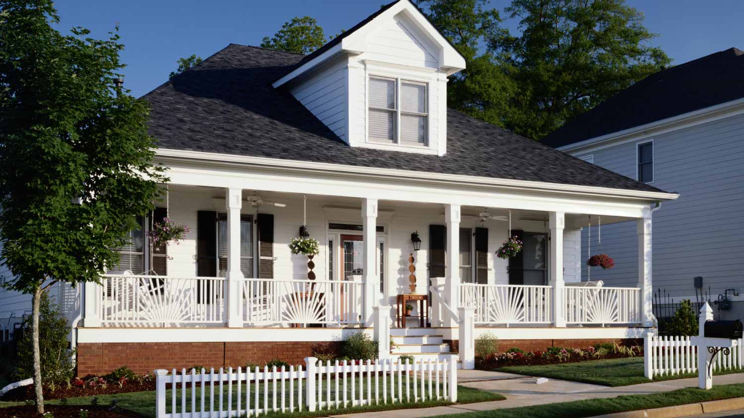 White house exterior with picket fence