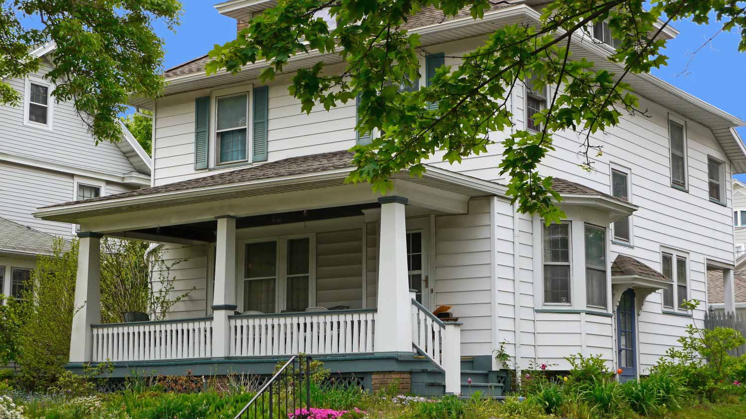 house with white siding and large front porch