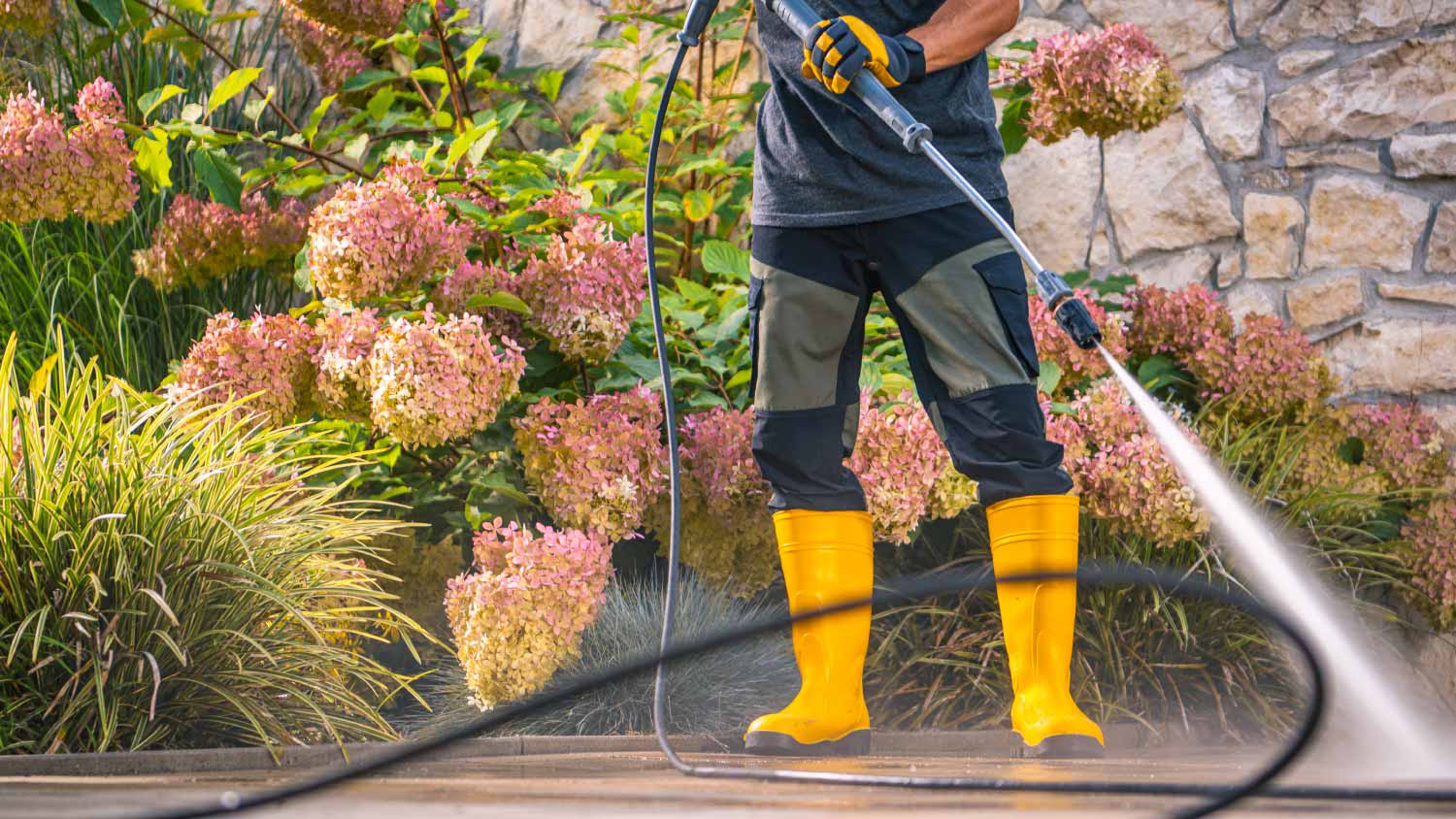 Man using a pressure washer