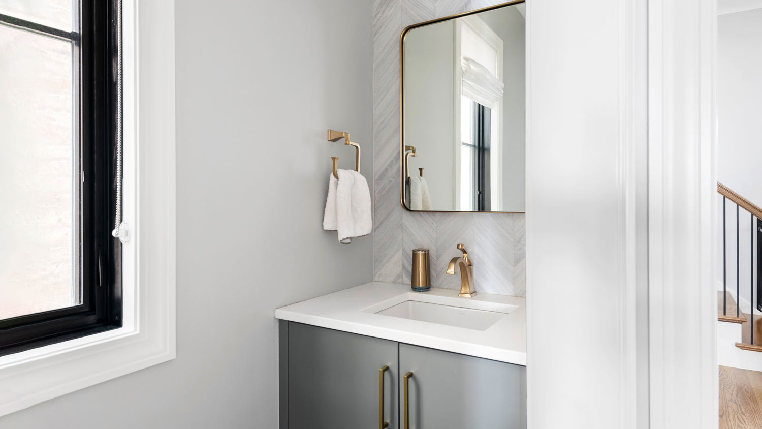 white and gray half bathroom