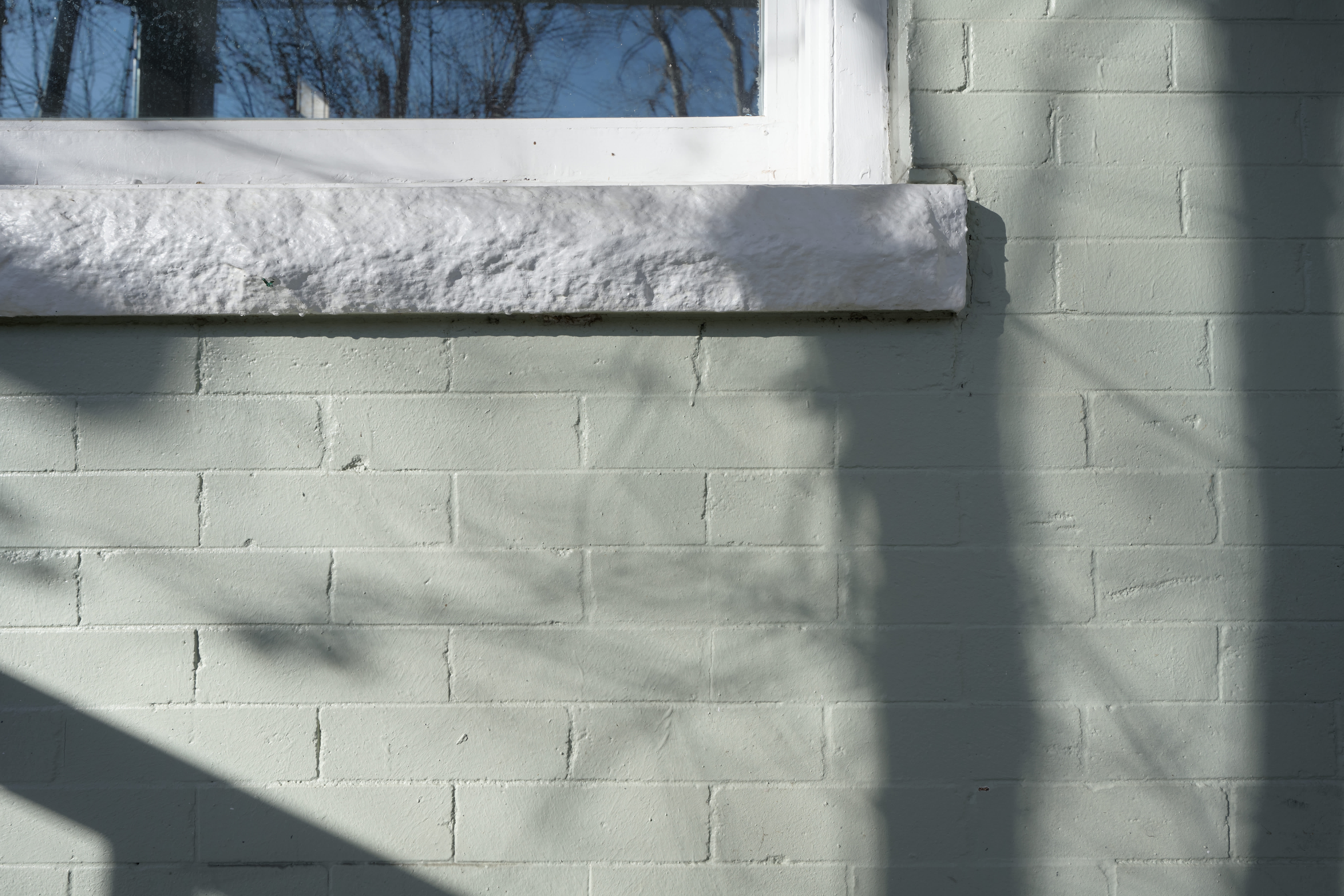 Painted brick house detail.