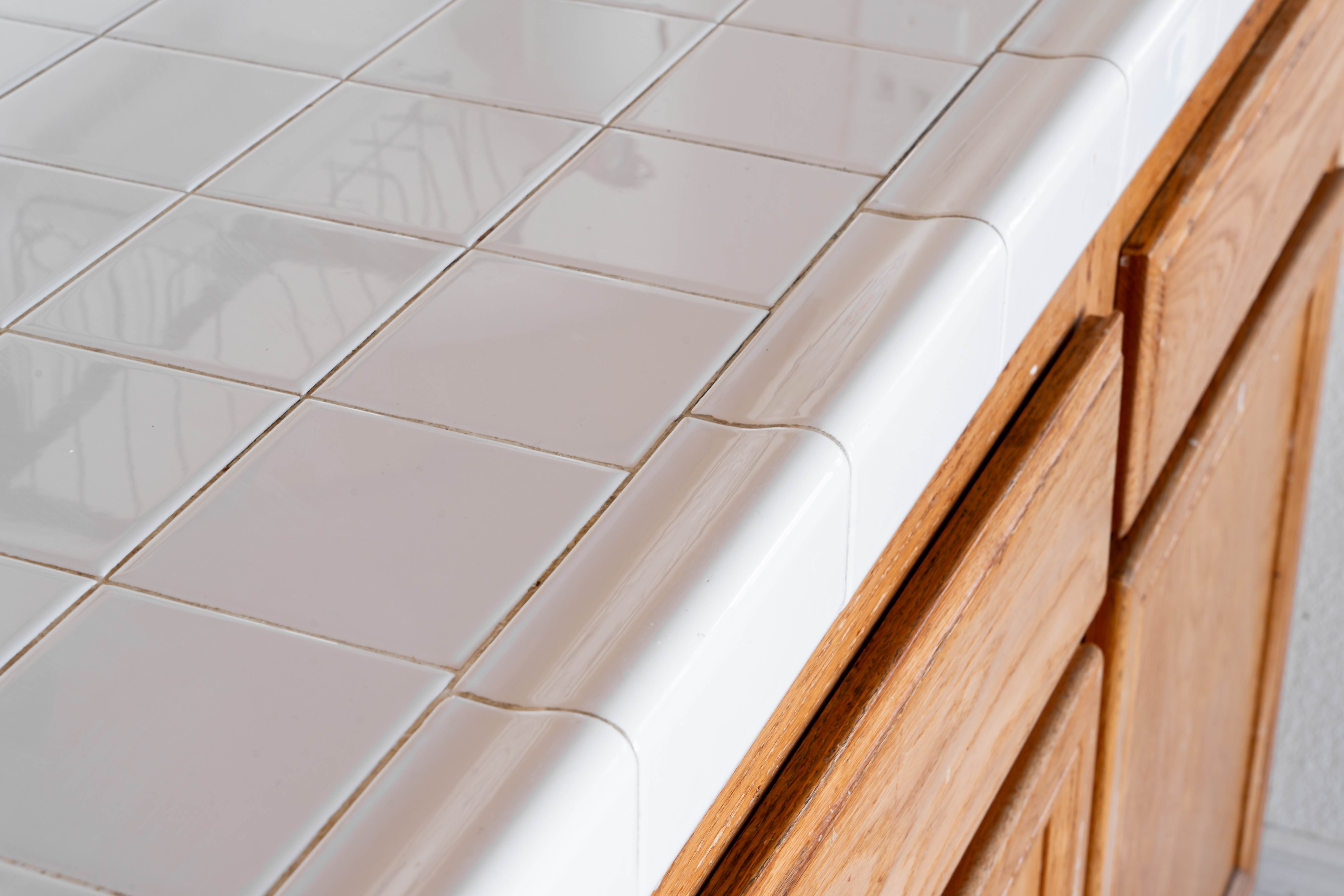 Closeup of cream tile countertop