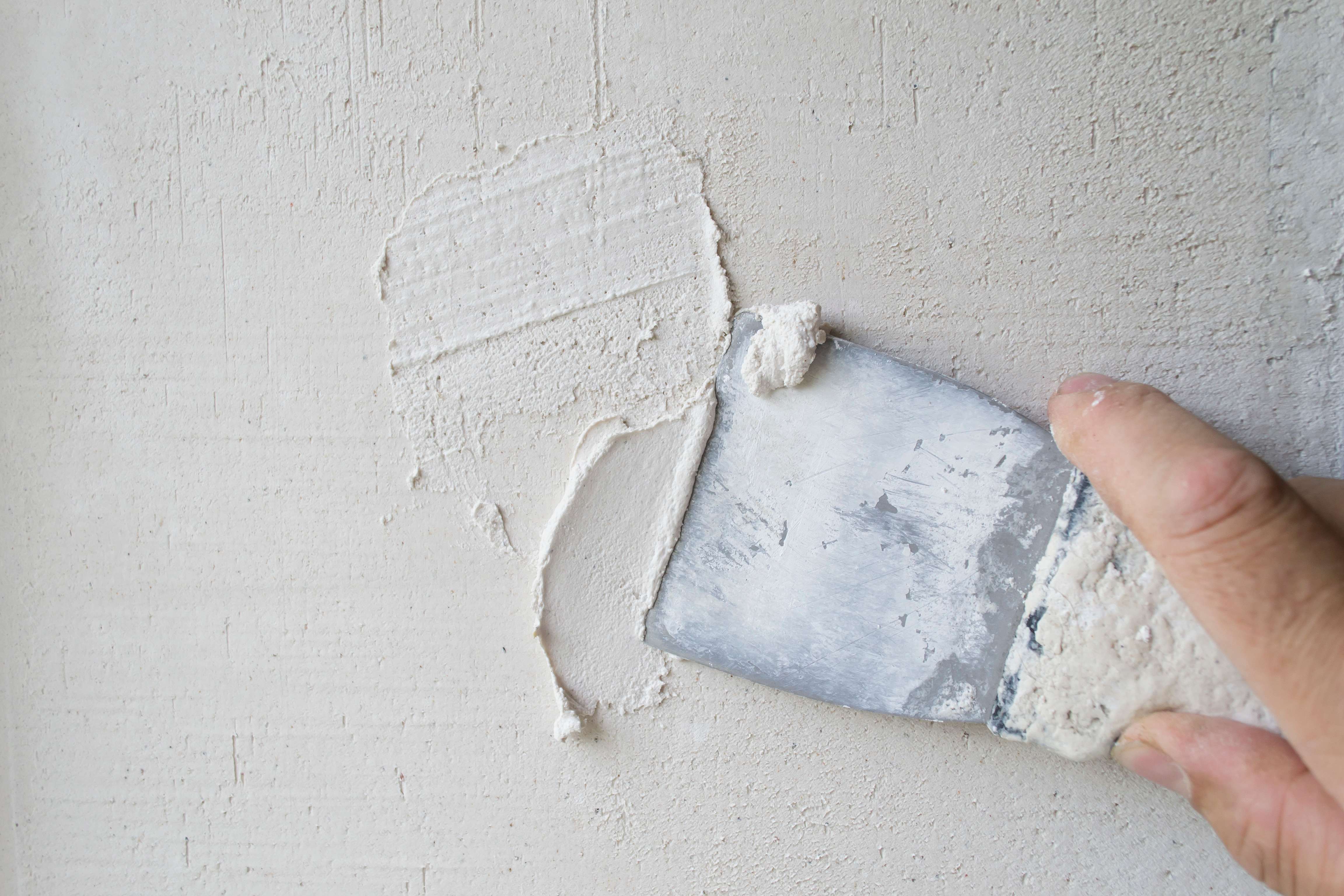 Close-up of plastering wall