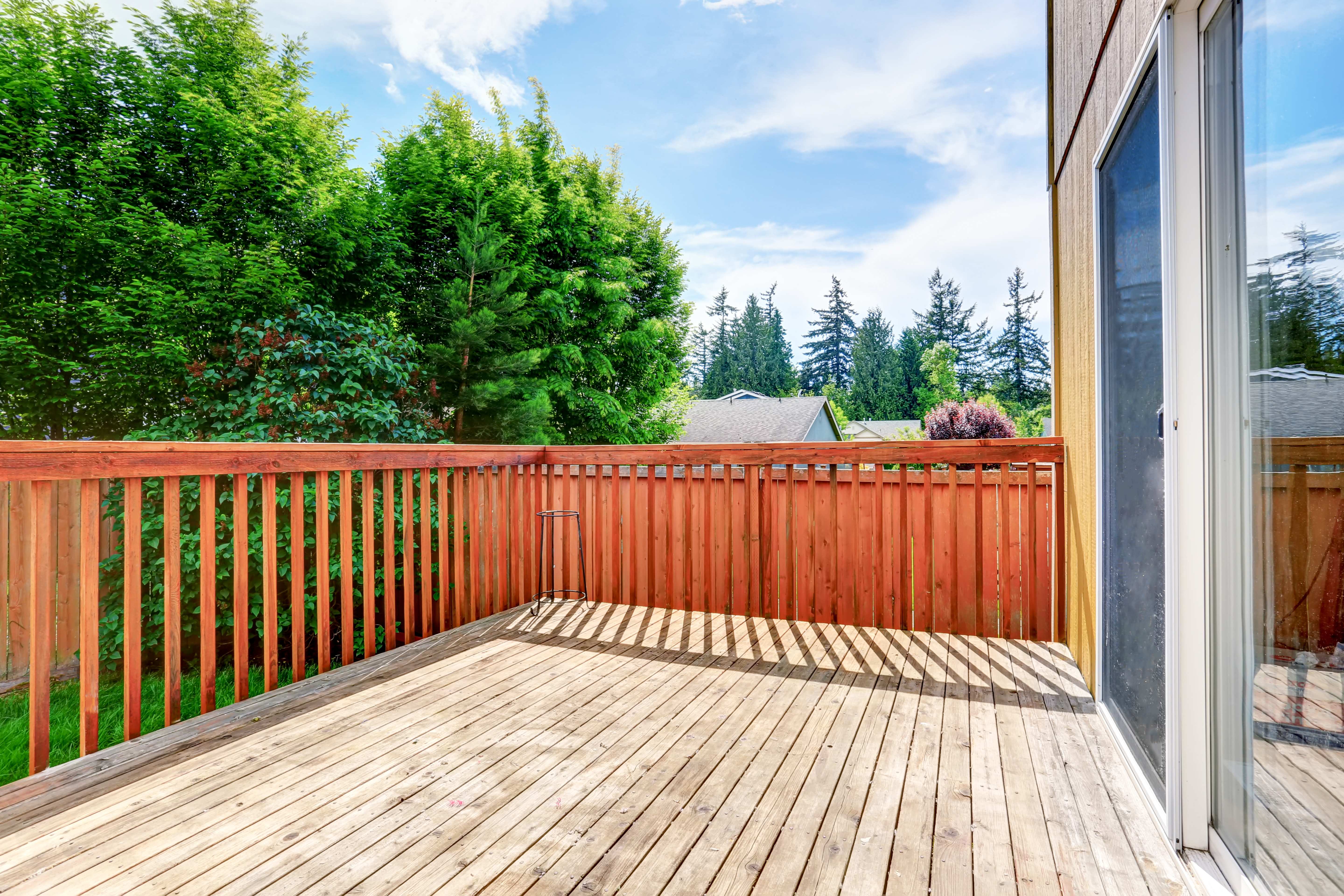 Raised deck with a wooden railing