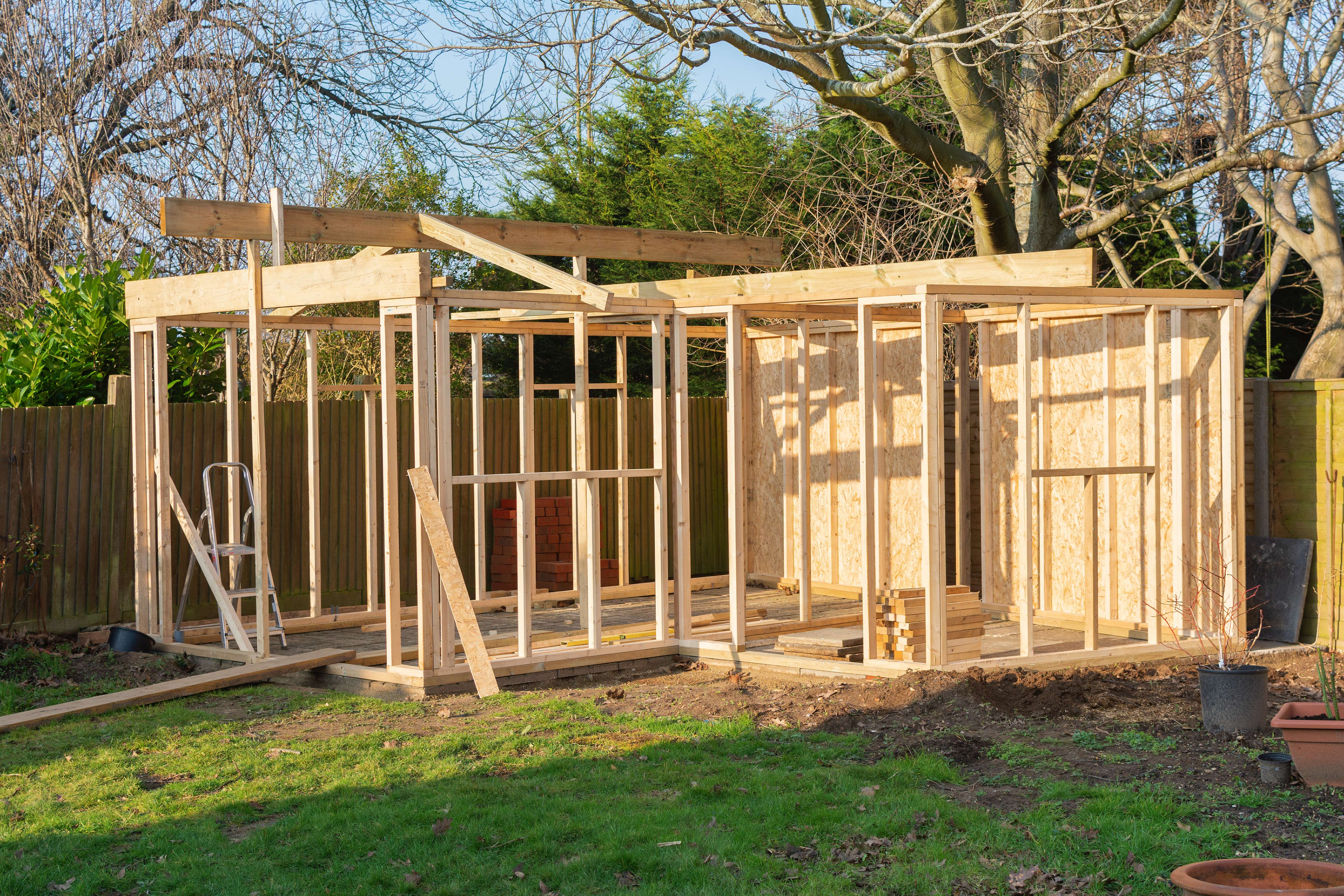 Unfinished shed framing in the yard