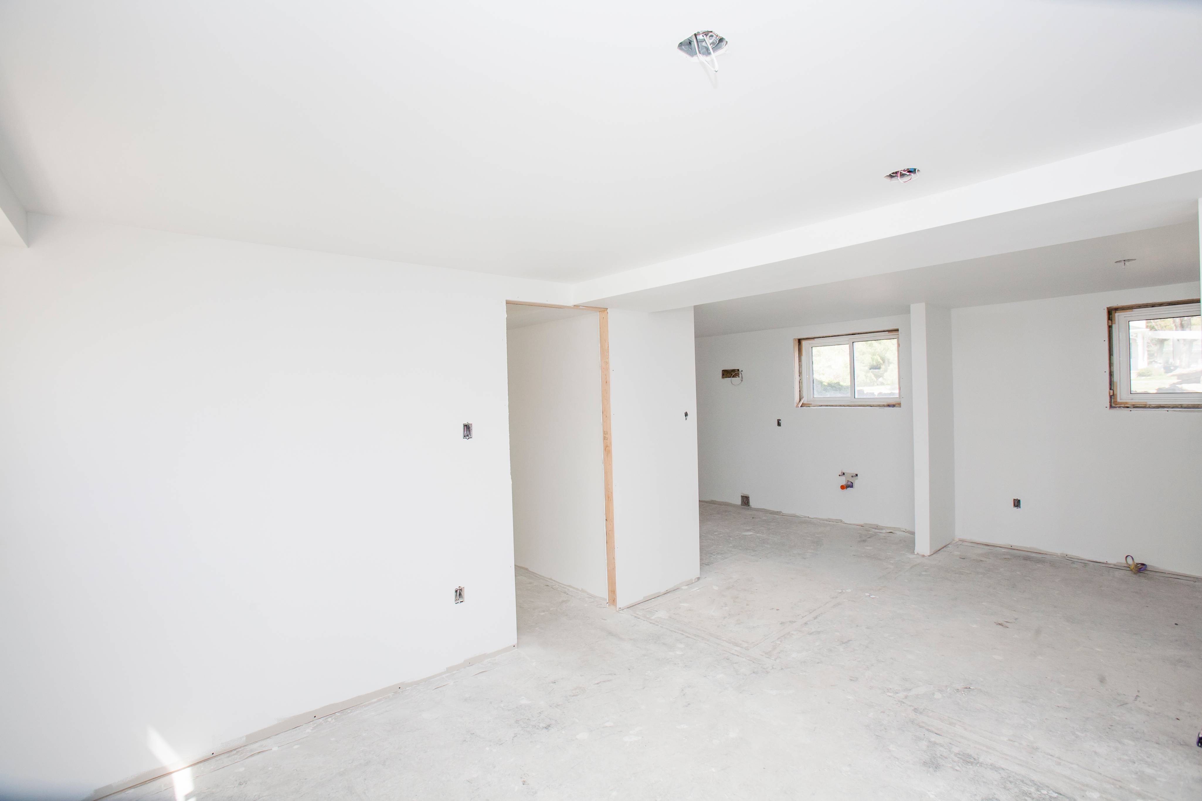A large basement with drywalls