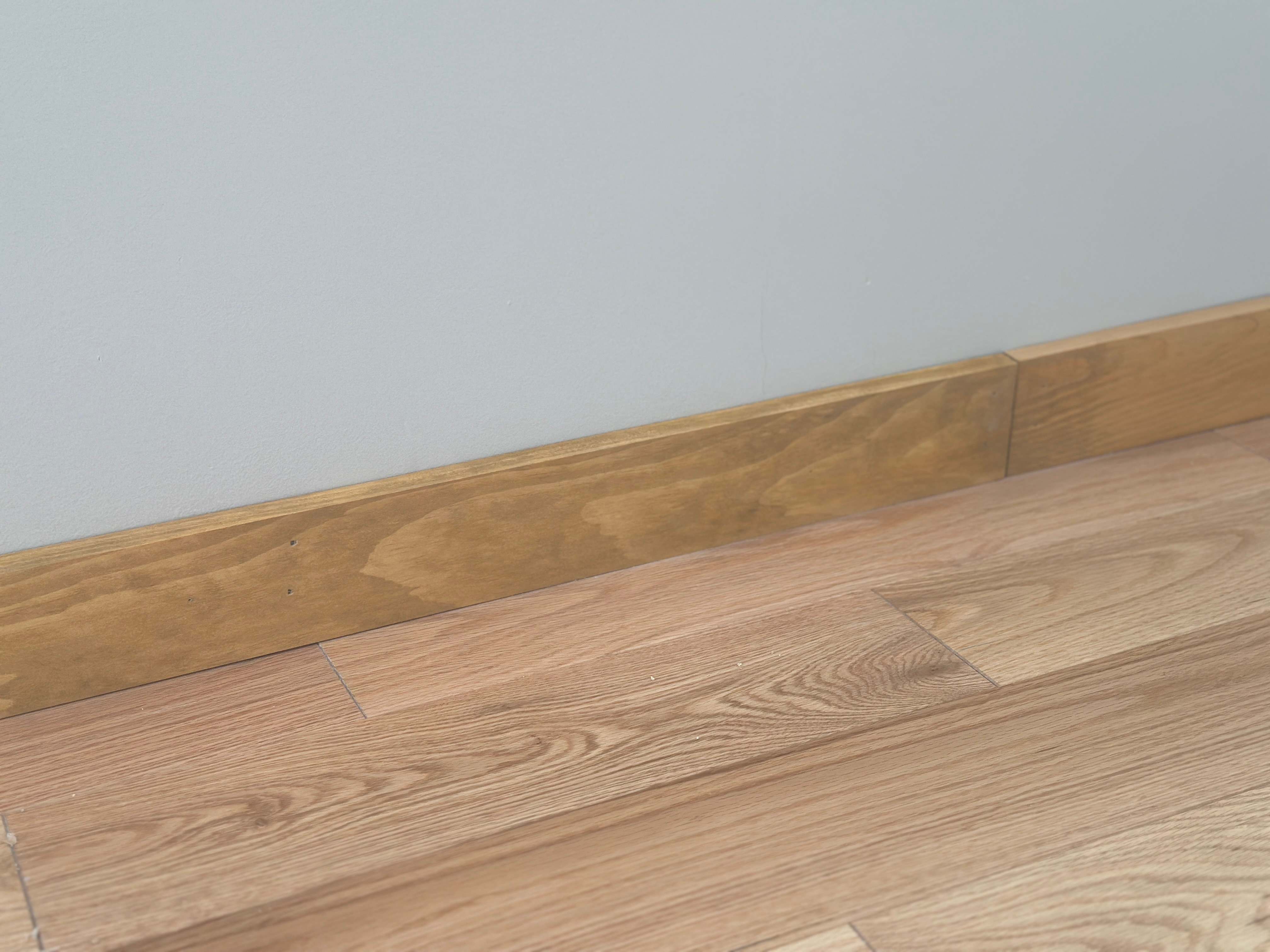 Close up of pine baseboard