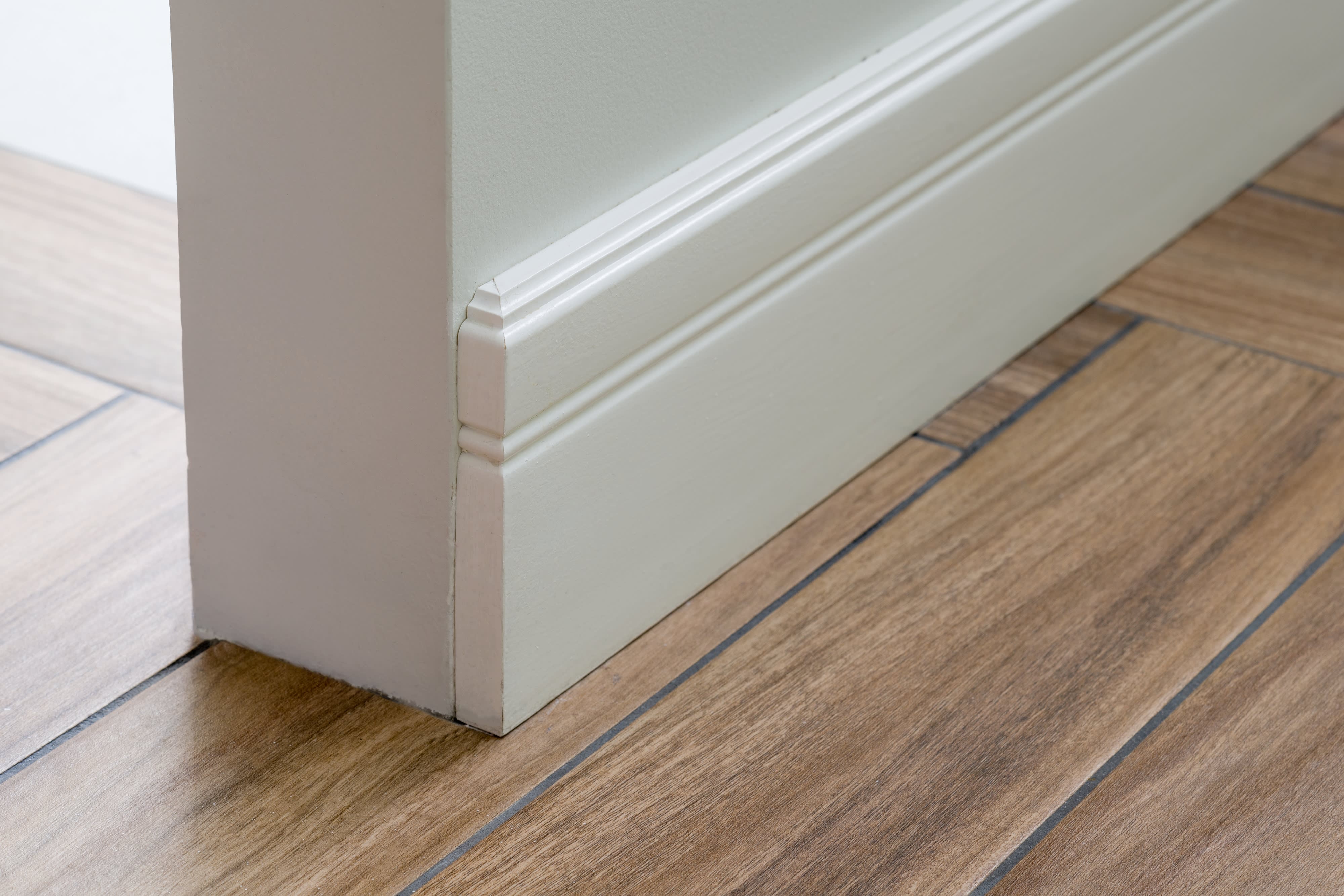 A close-up of a baseboard