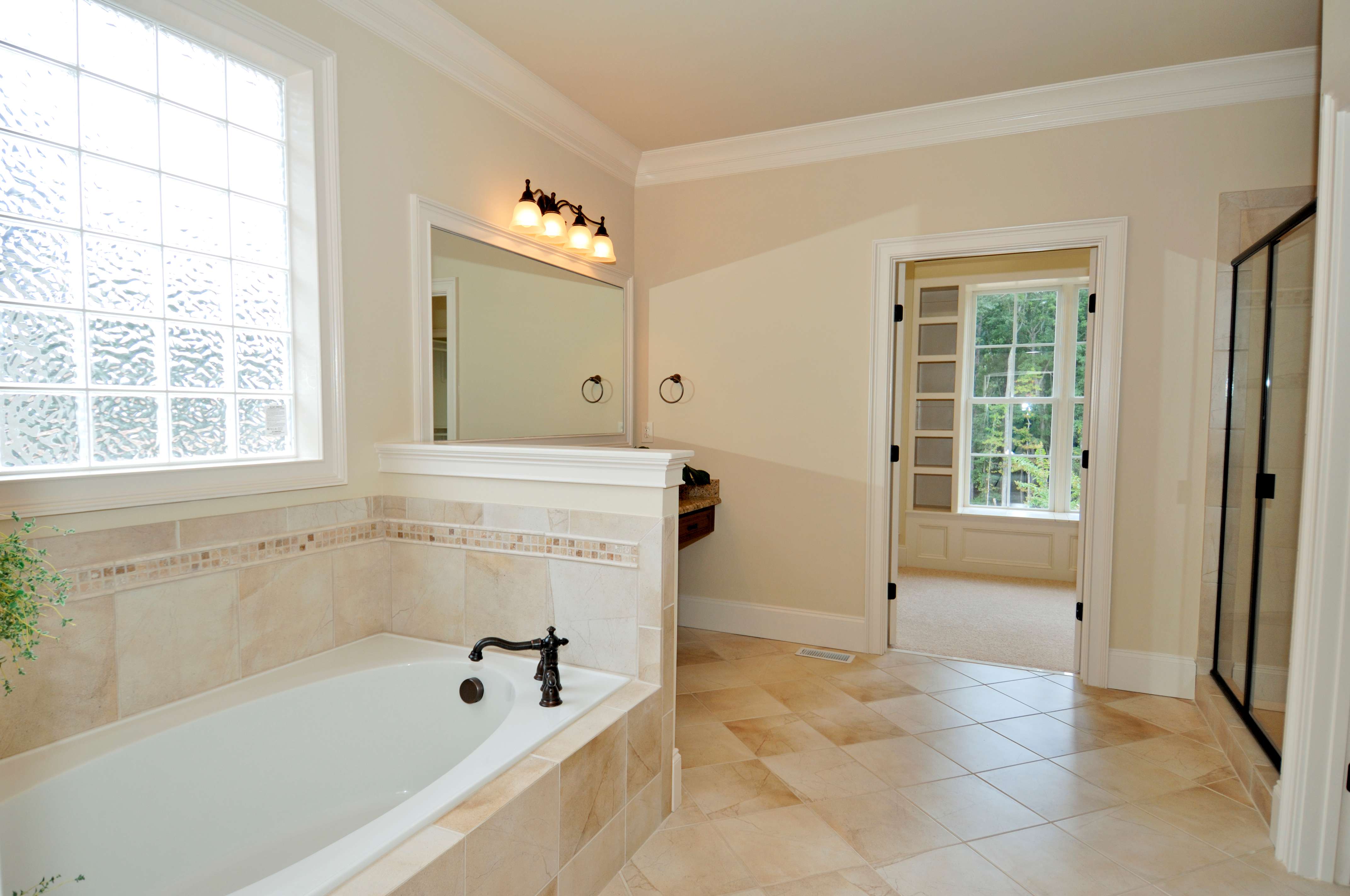 Luxury master bathroom with roman tub