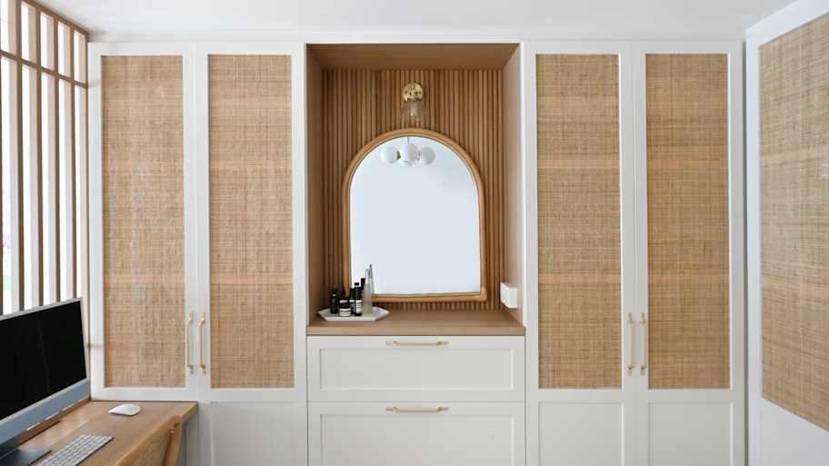 A stylish bedroom showcases built-in cabinetry