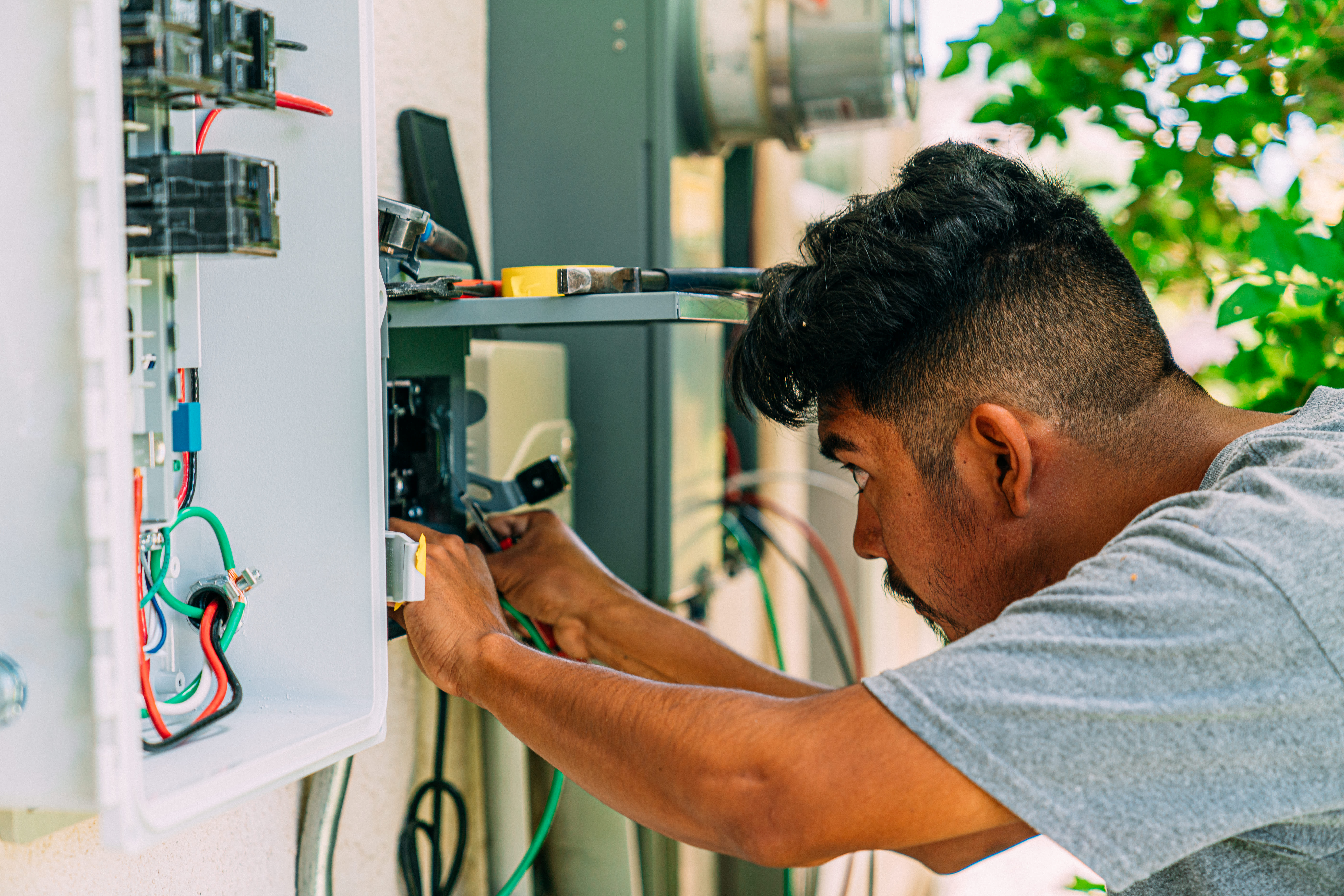 Man checking electrical box