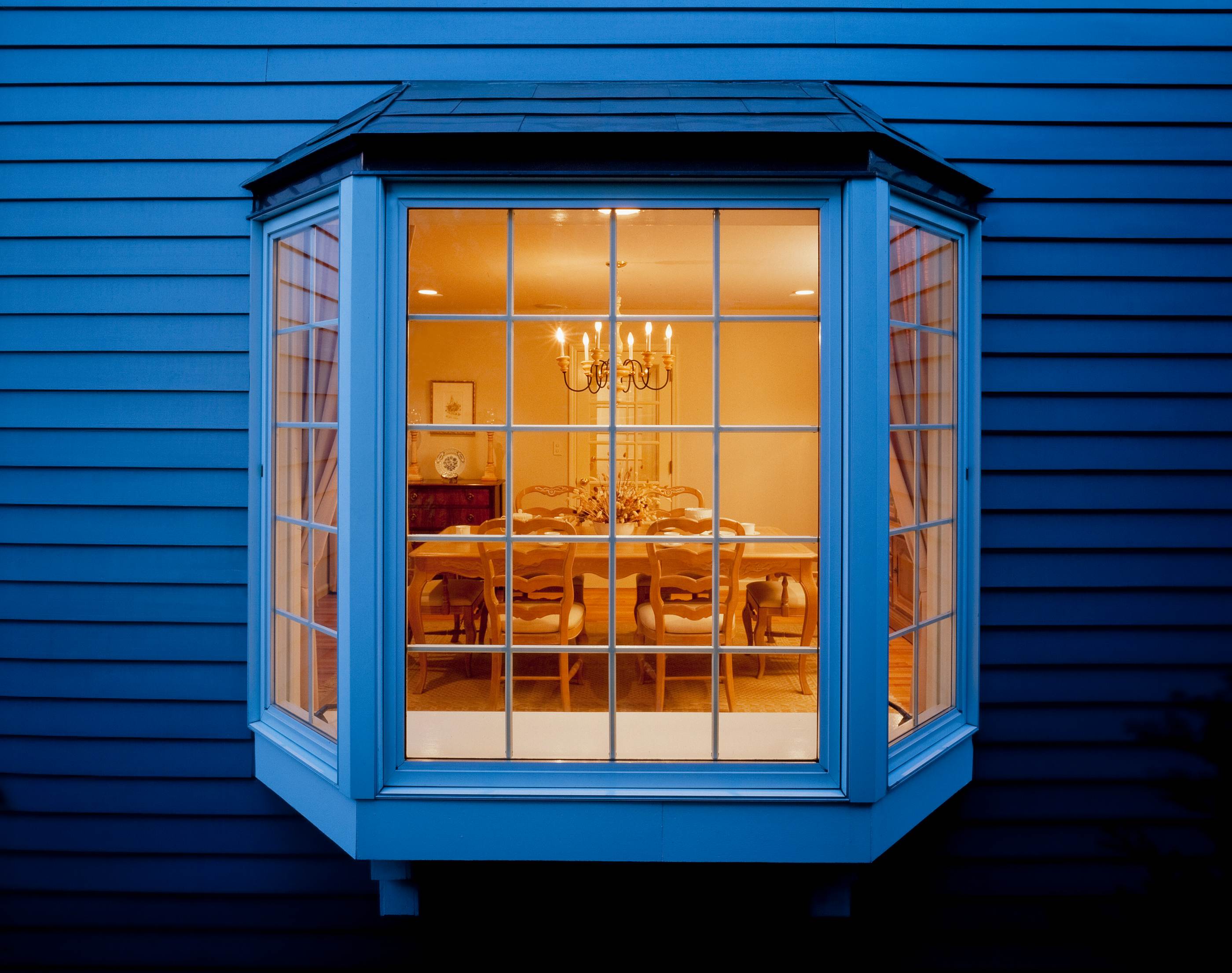 A bay window at dusk