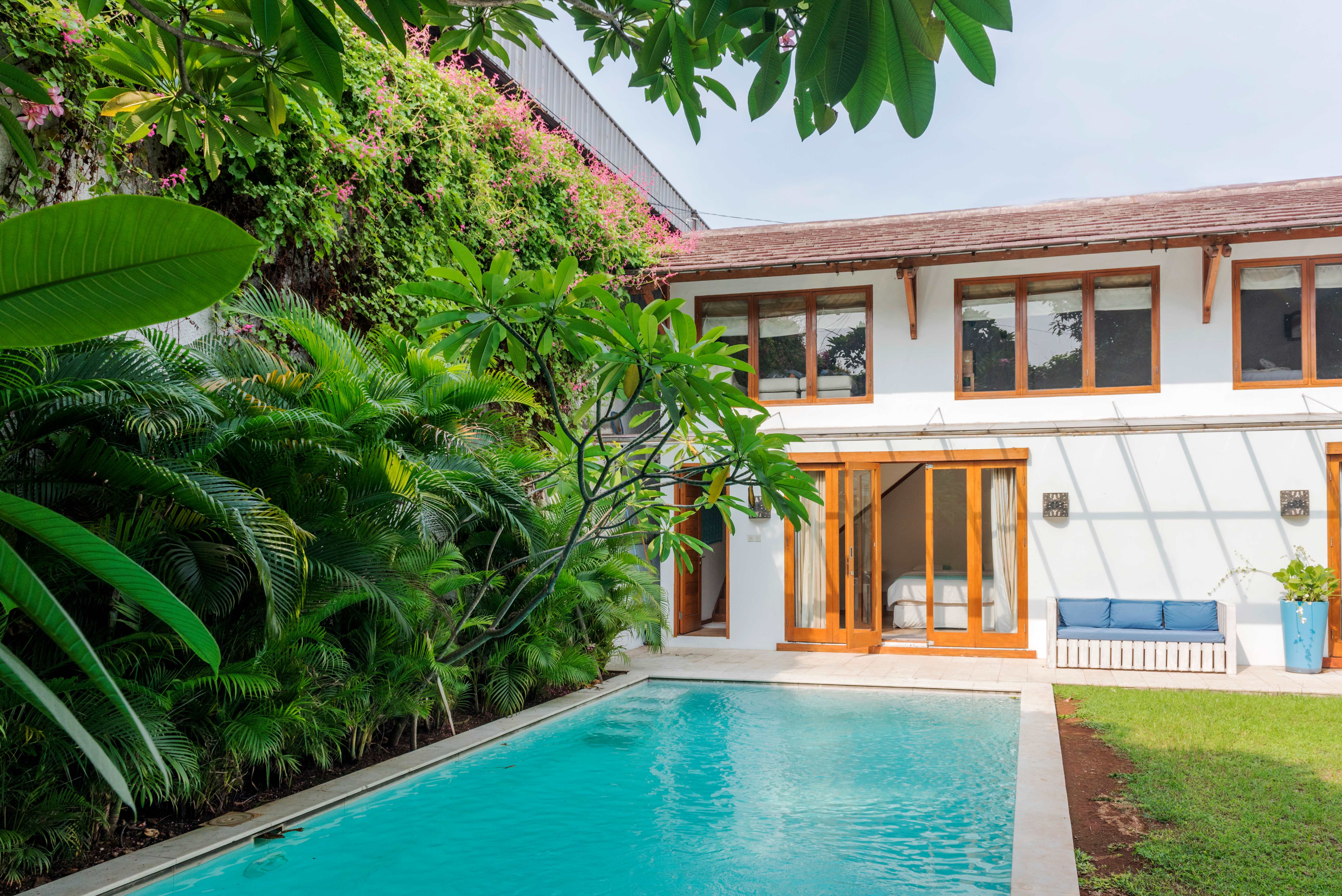 A beautiful pool in the backyard of a house