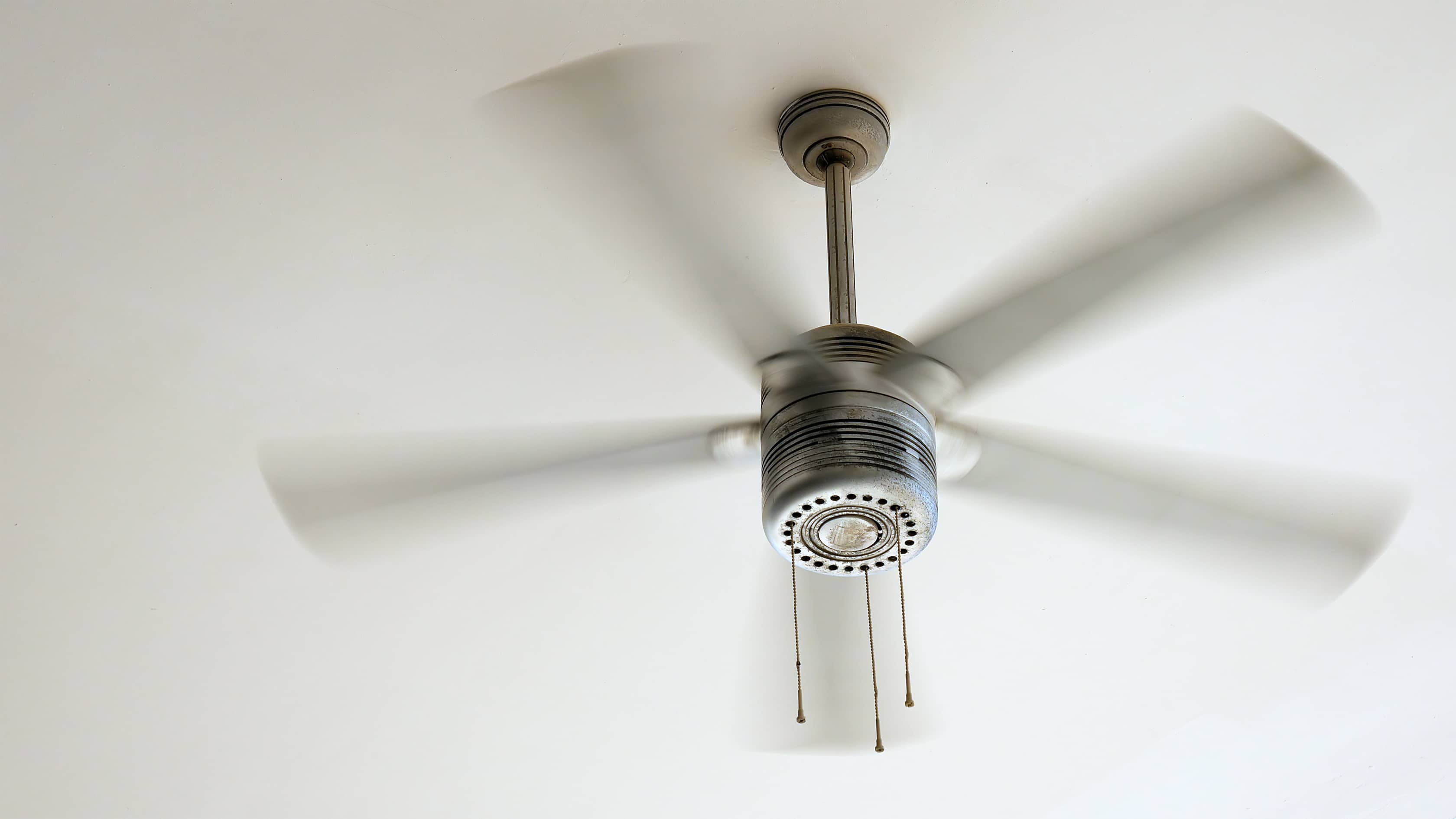 A ceiling fan spinning gently