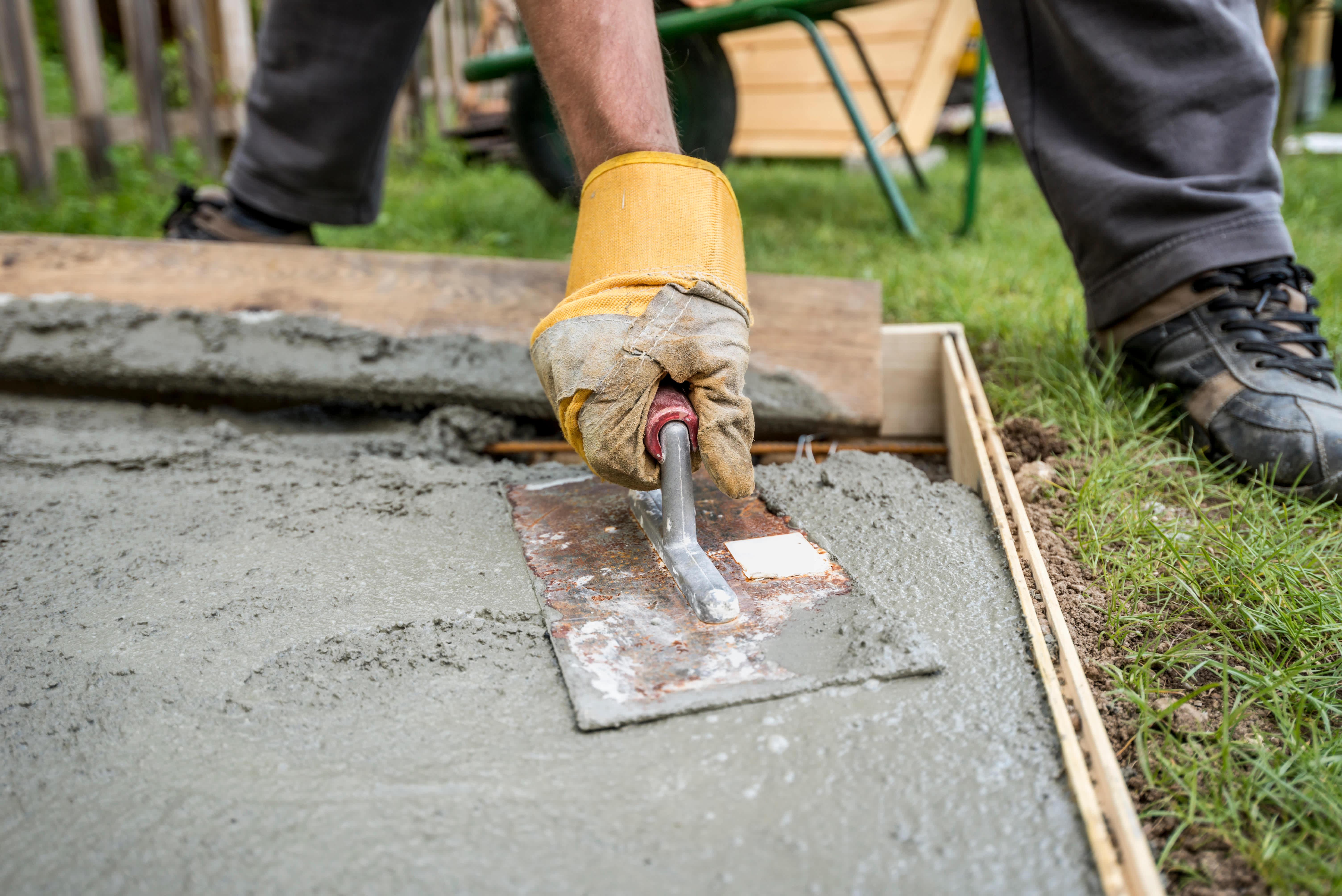 paver smoothing fresh concrete