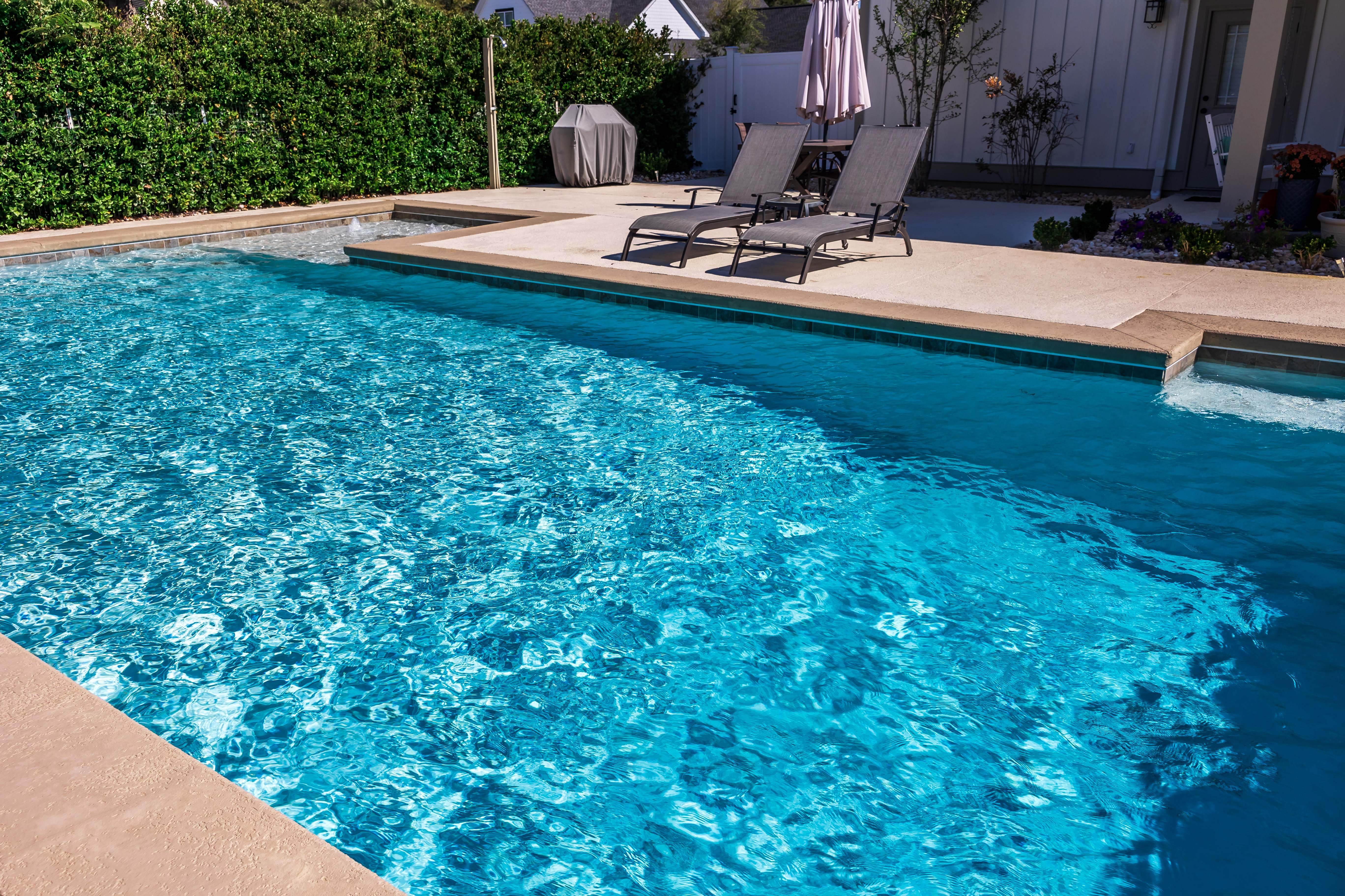 backyard swimming pool in boston Photo: Ursula Page/ Adobe Stock