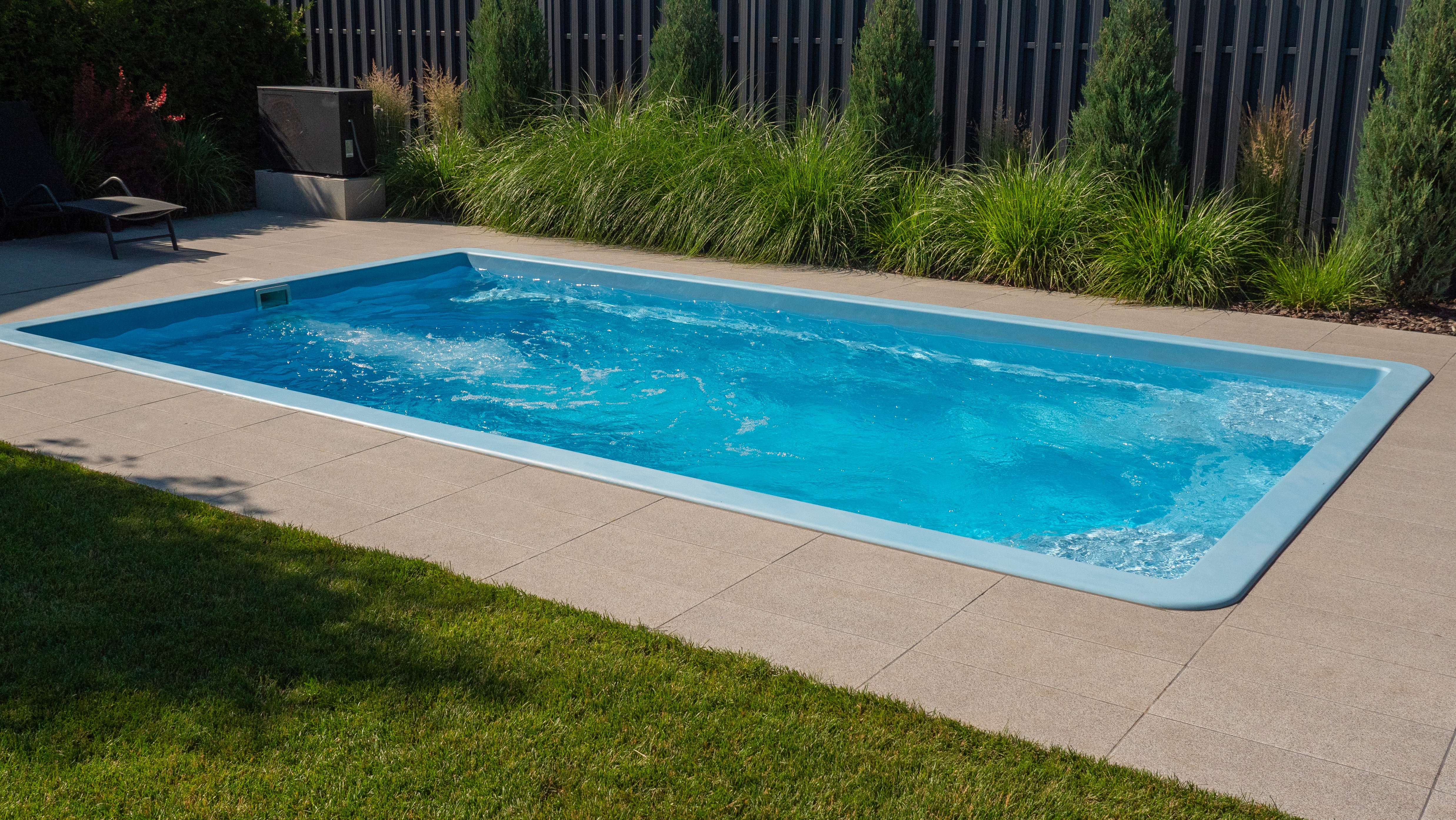 small swimming pool in backyard