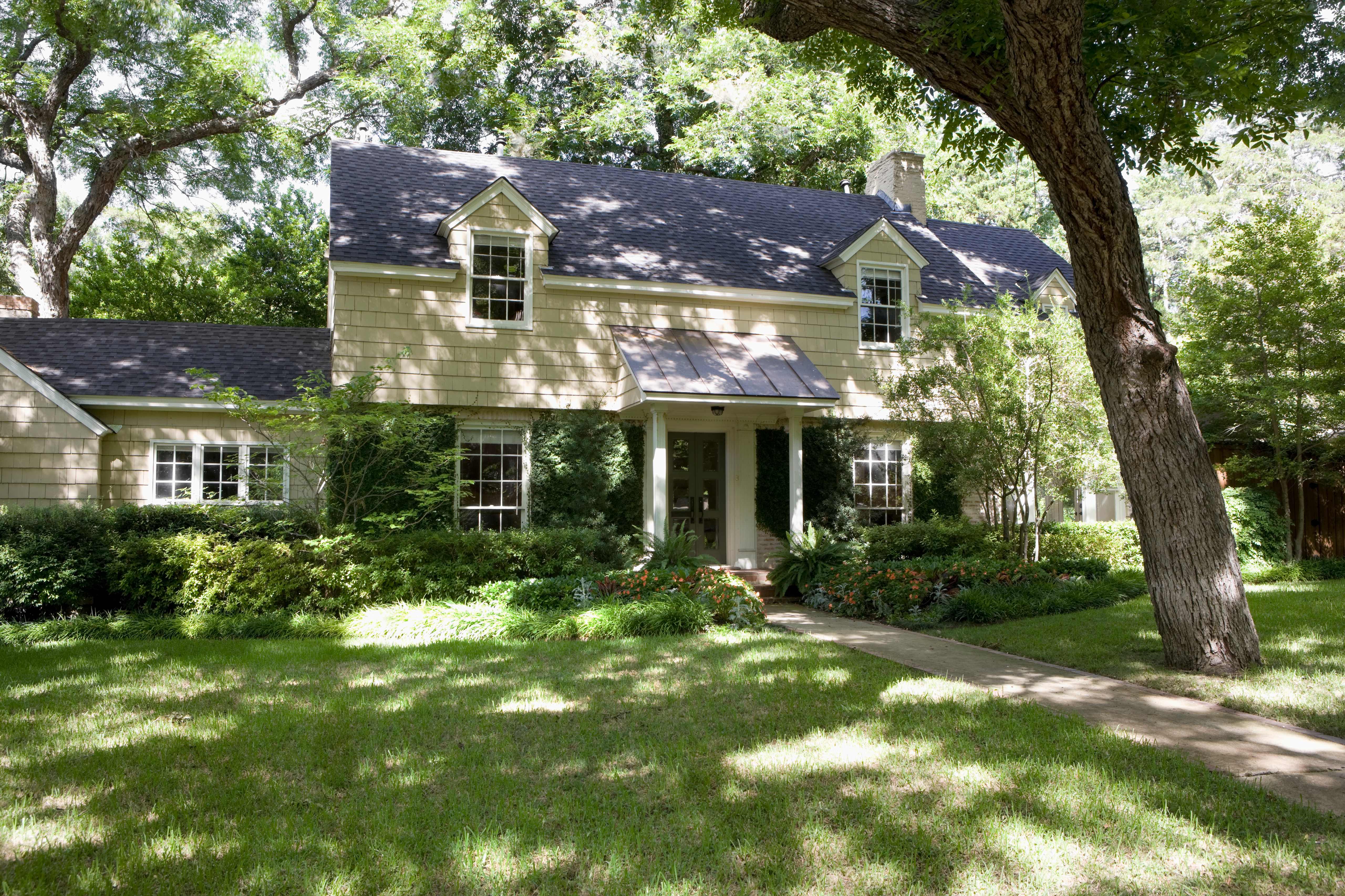 The exterior of a beautiful house with lawn