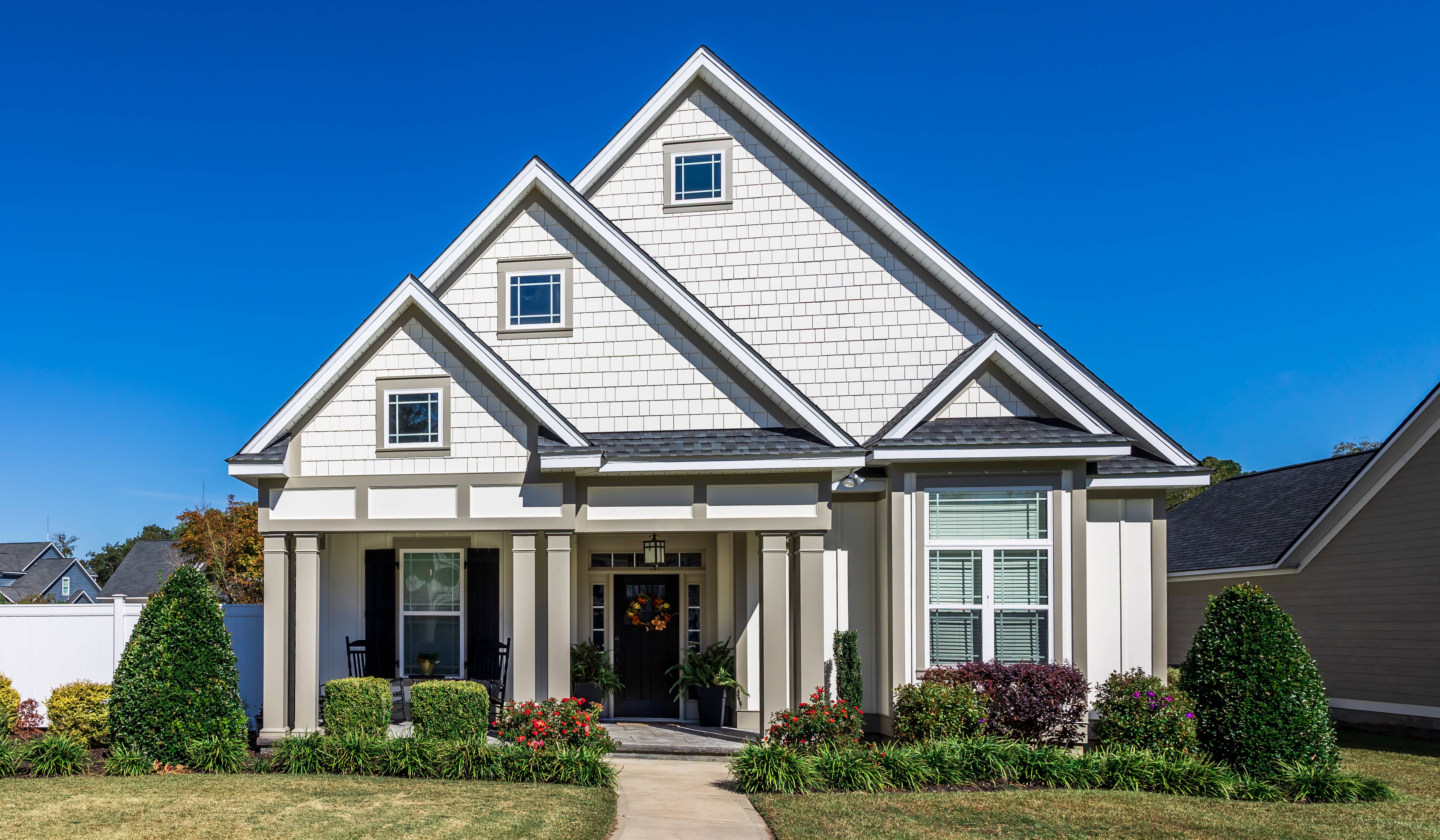 House with fiber cement siding and multi-gable roof