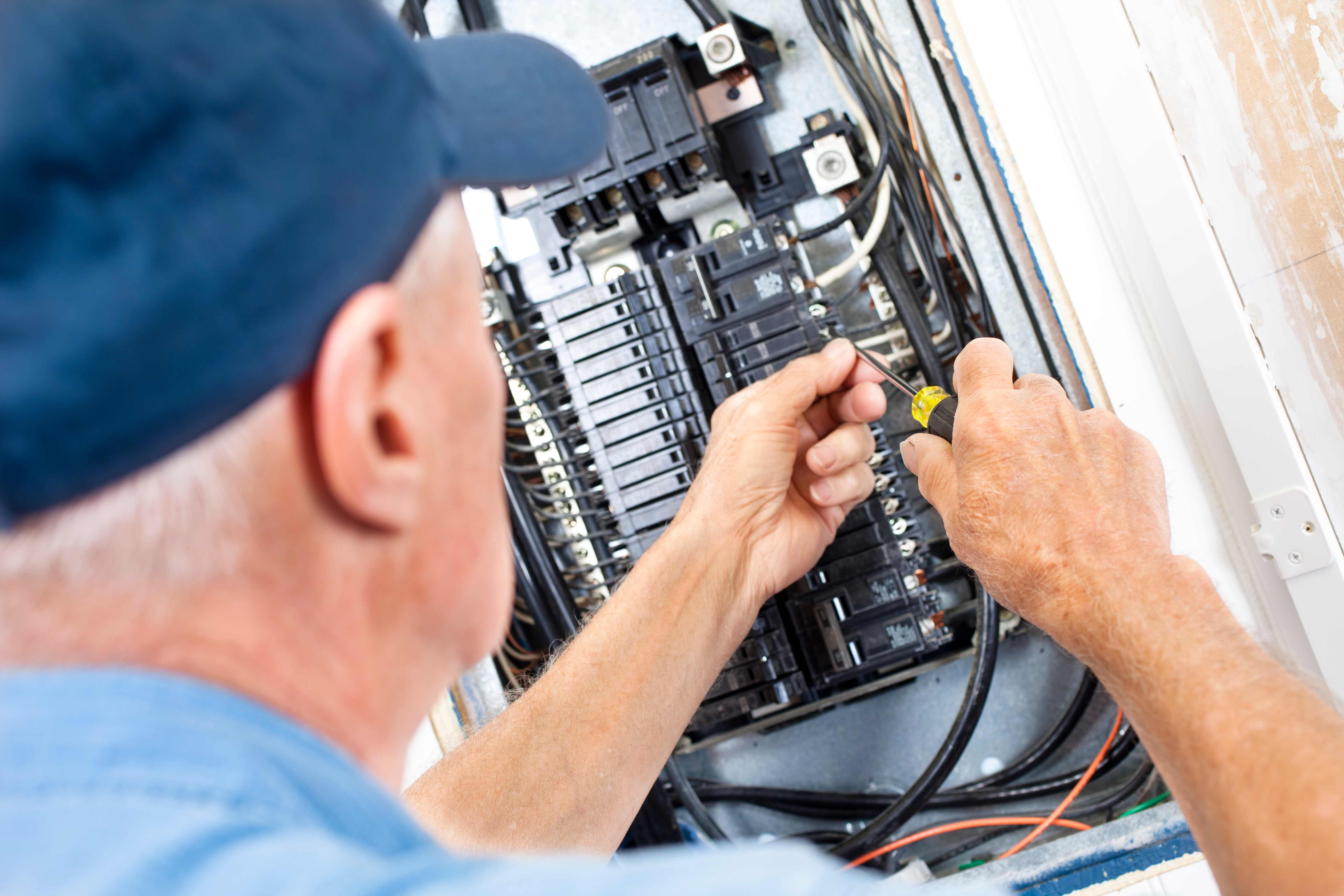 Electrician doing electrical work