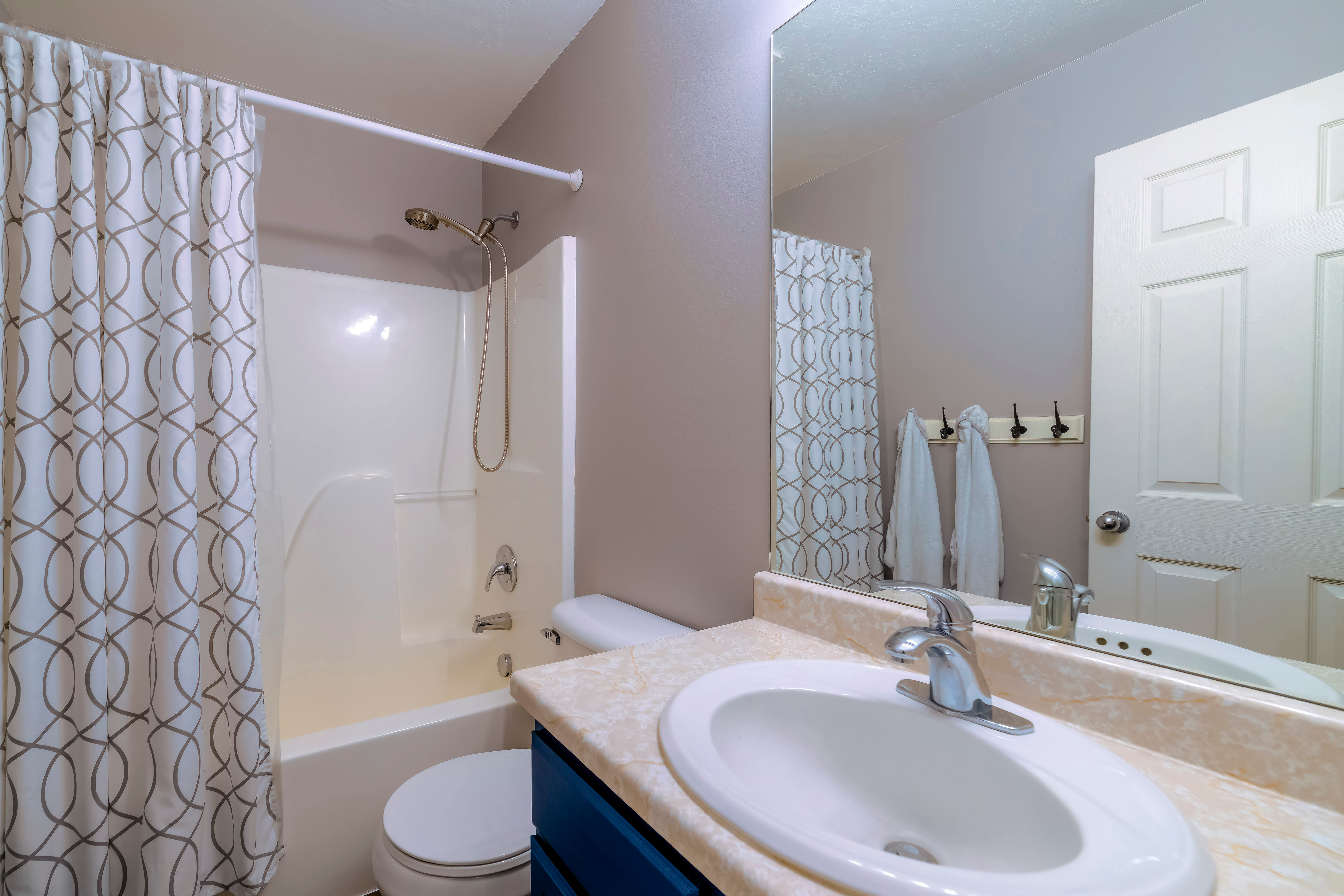 Large bathroom with acrylic shower