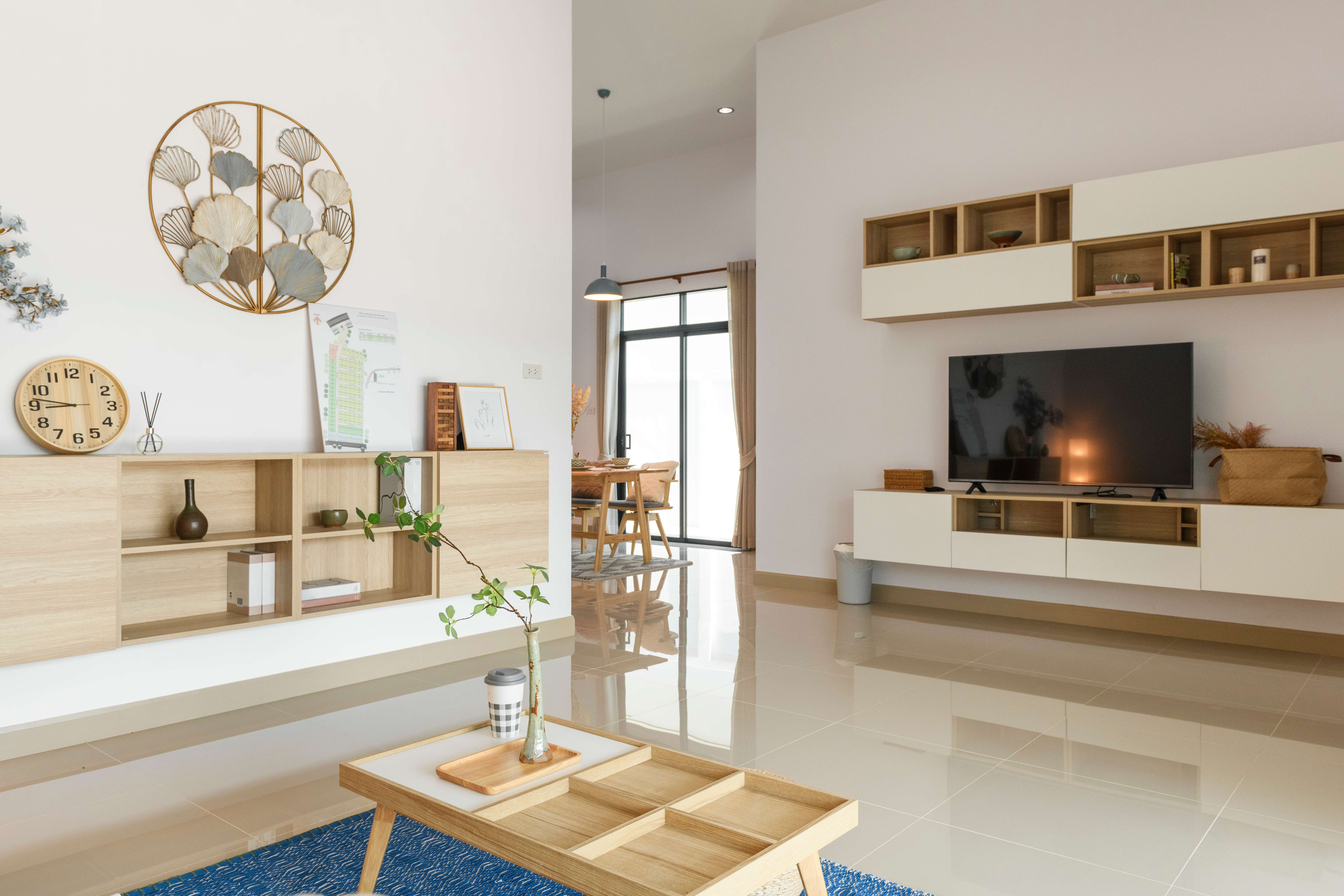 A modern living room with beige baseboards