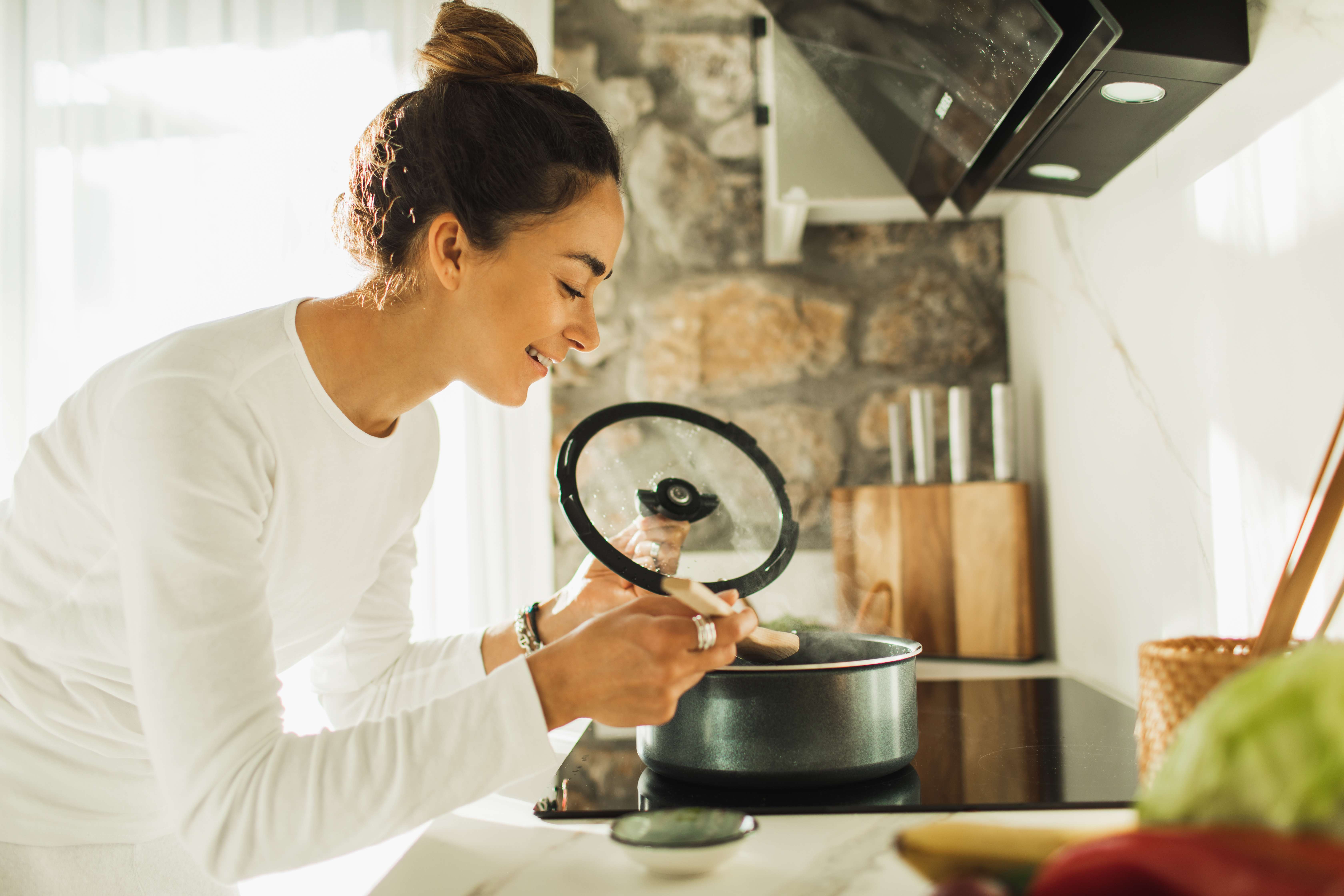 Woman cooking lunch