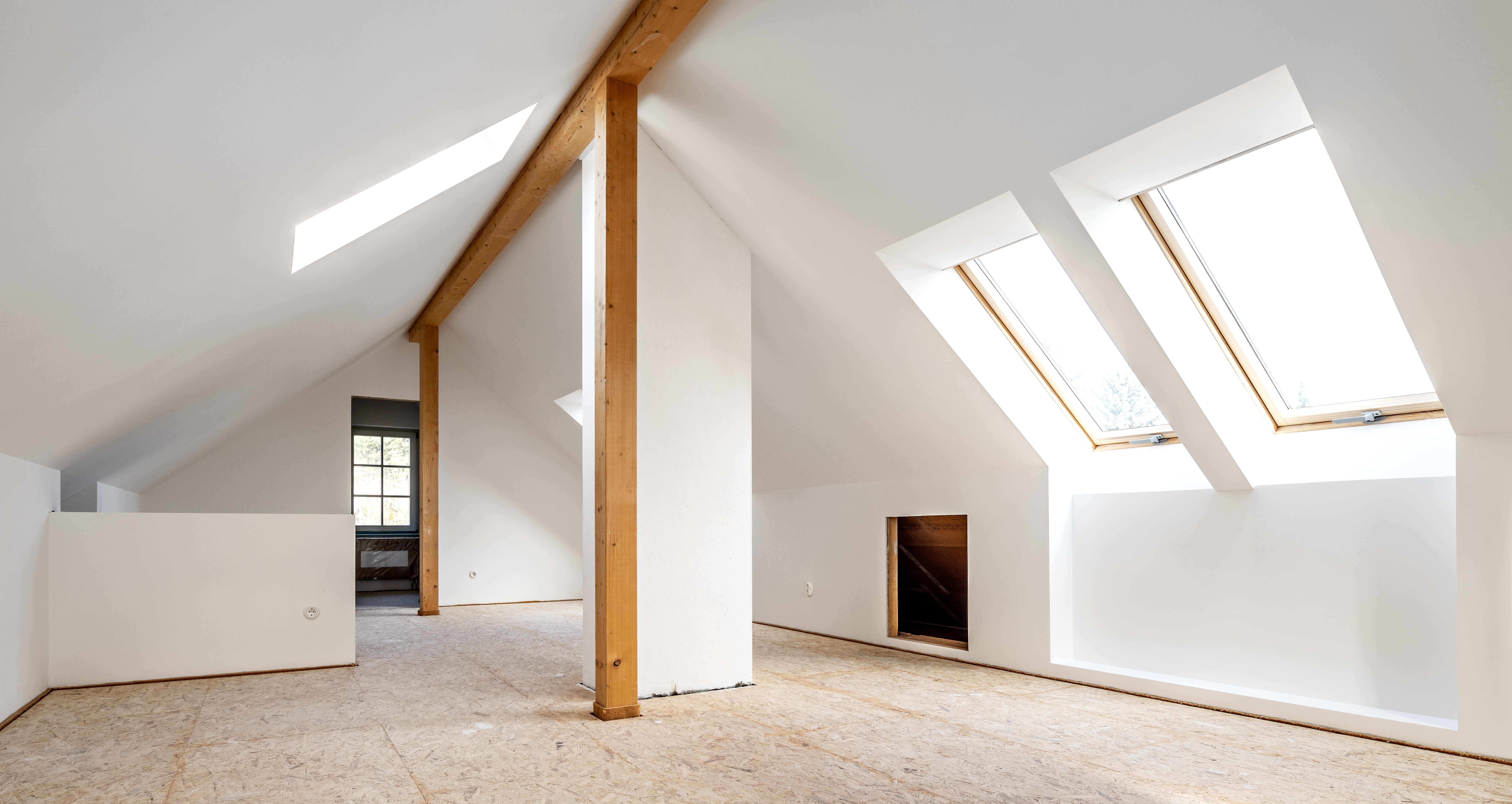 empty attic room with knee walls