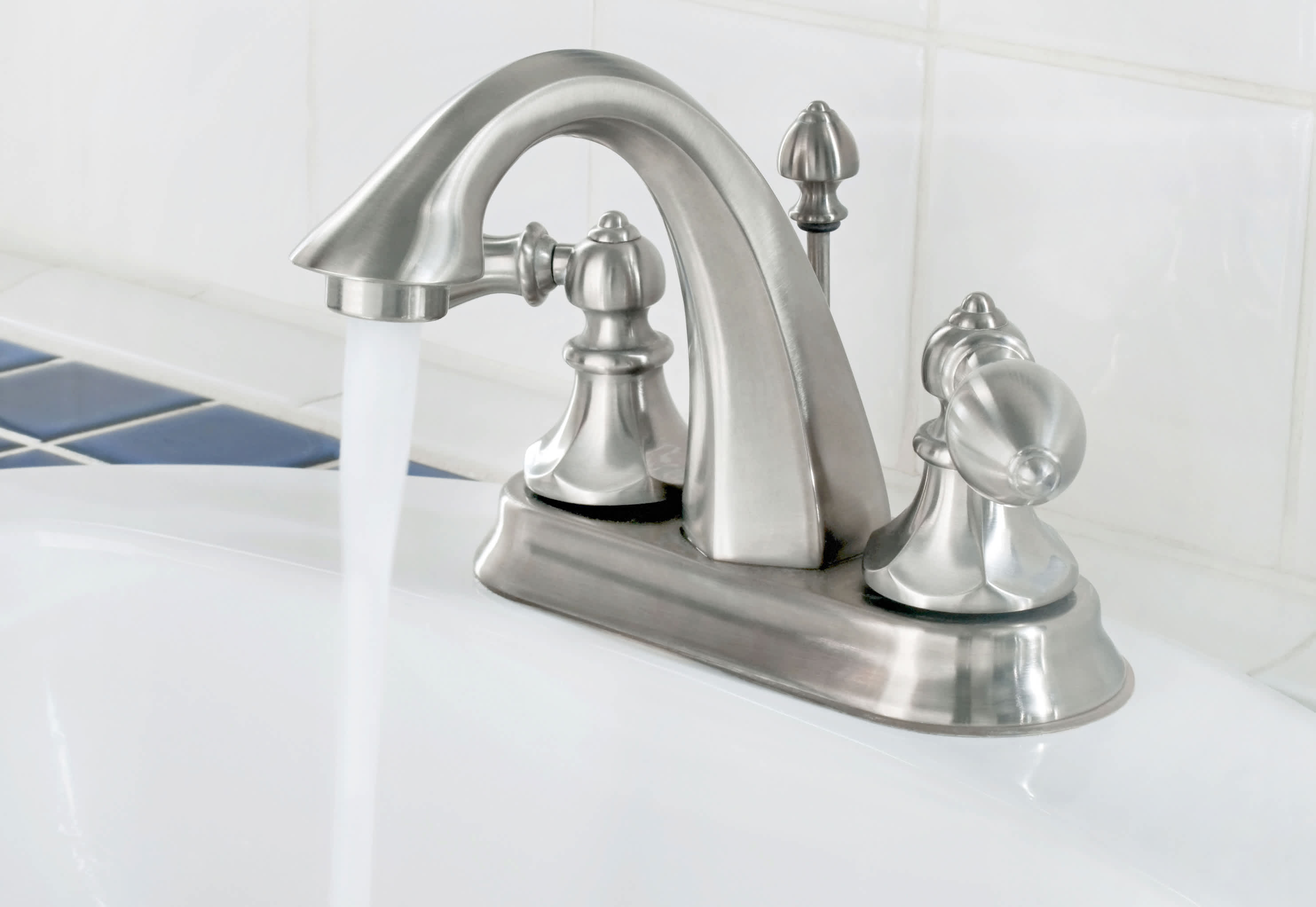 Brushed nickel fixture with running water