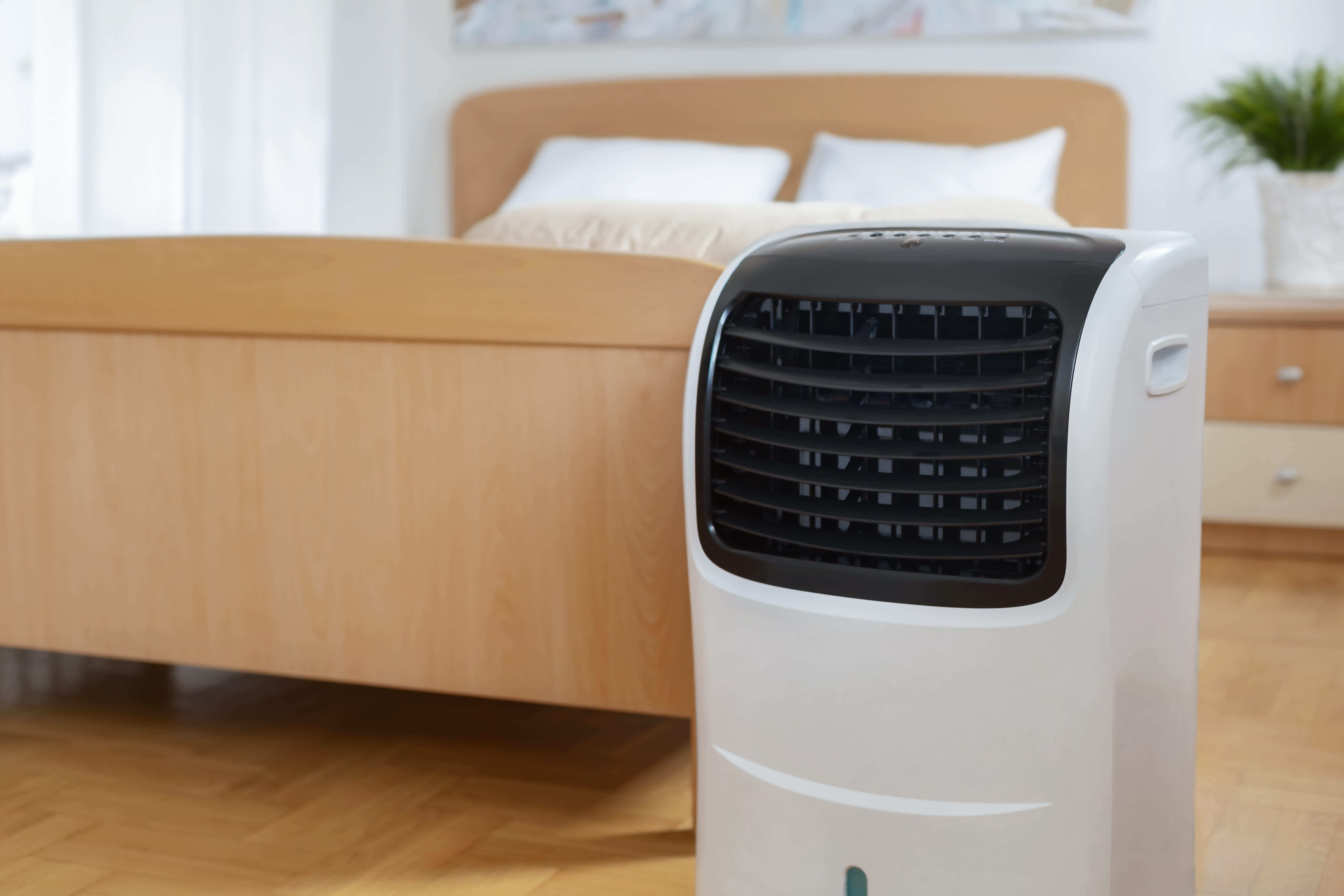 A swamp cooler in the bedroom