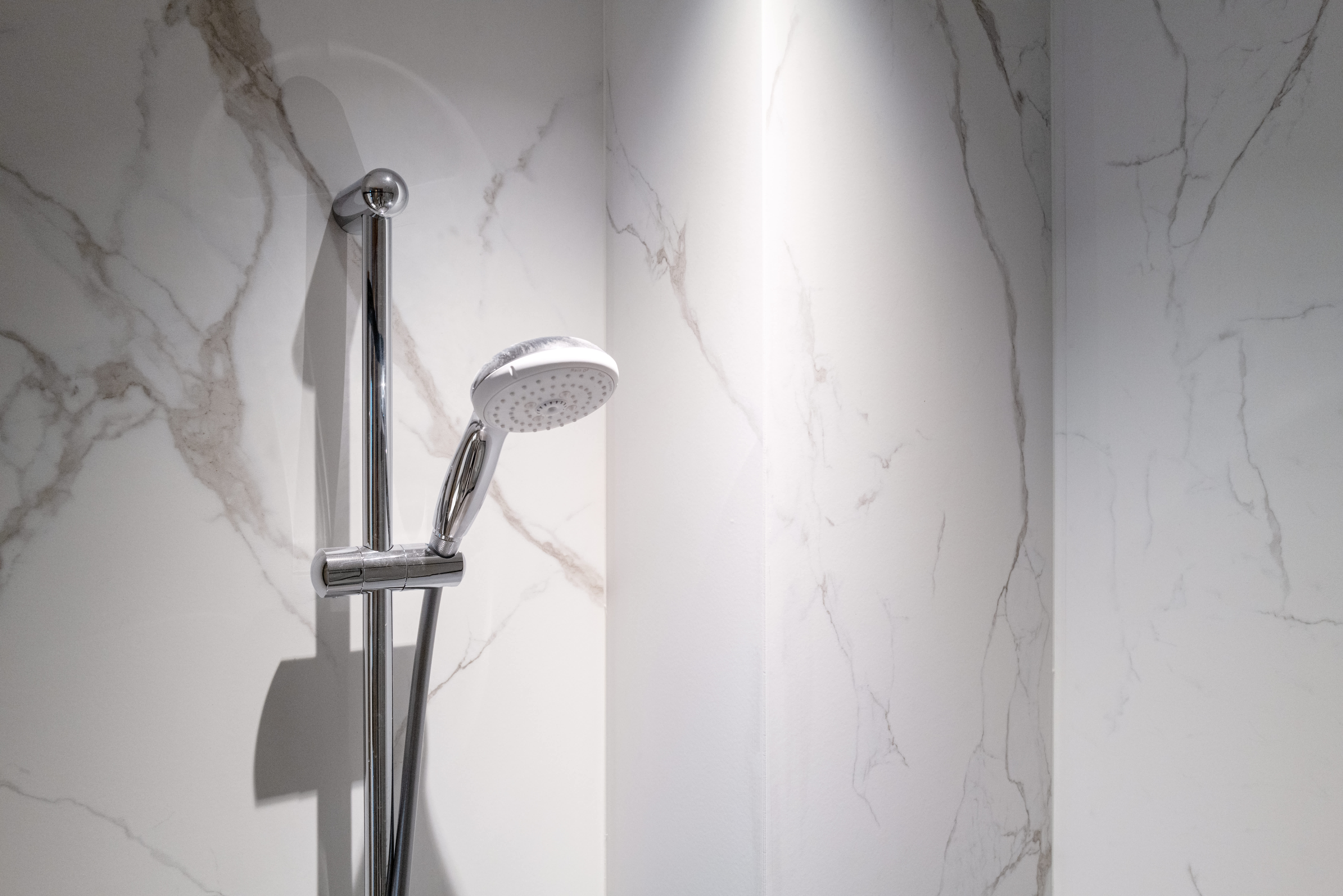 Close-up of a quartz shower wall