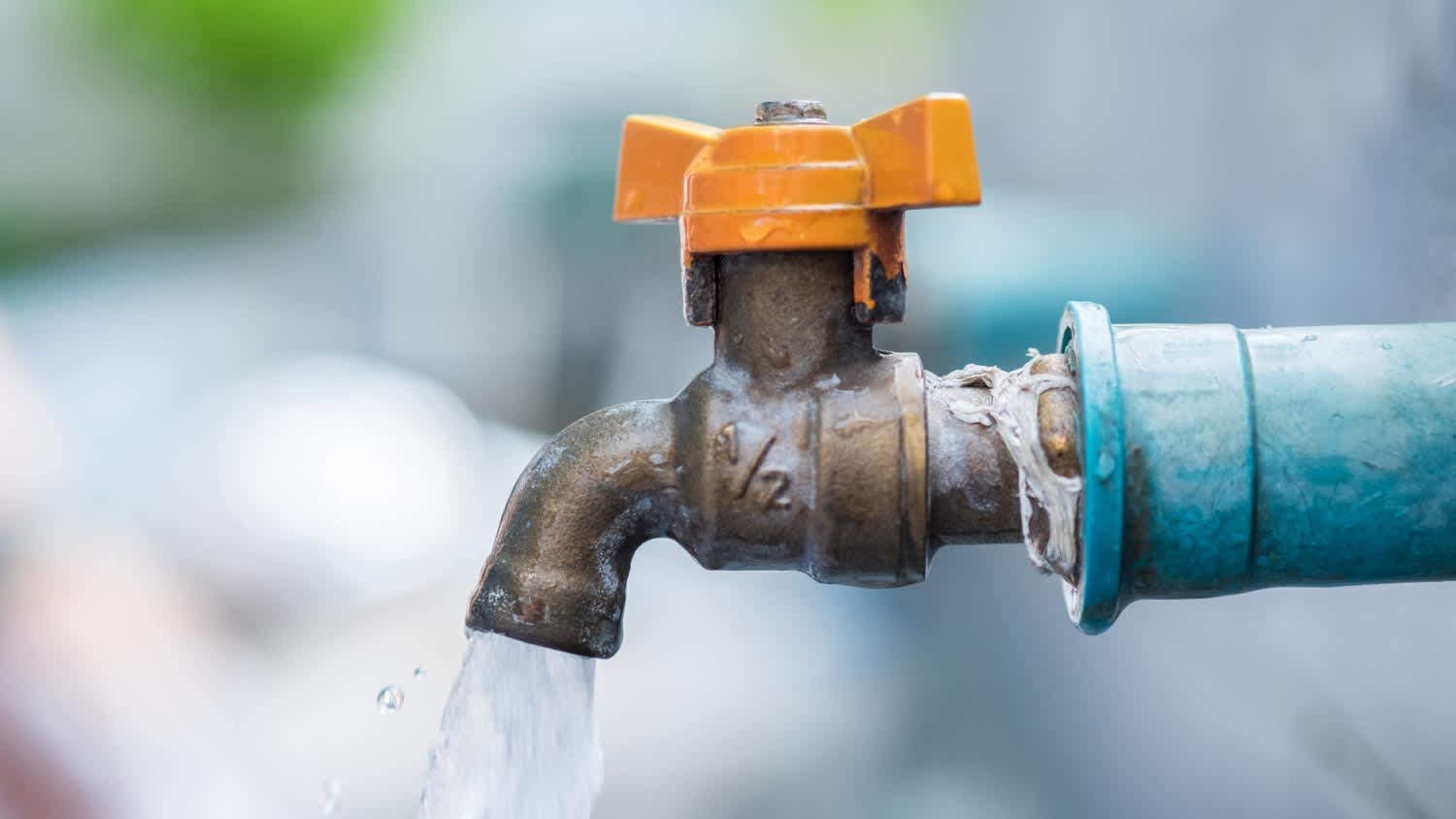A close up of a old faucet