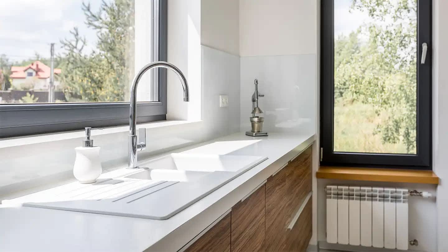 white kitchen sink and countertop