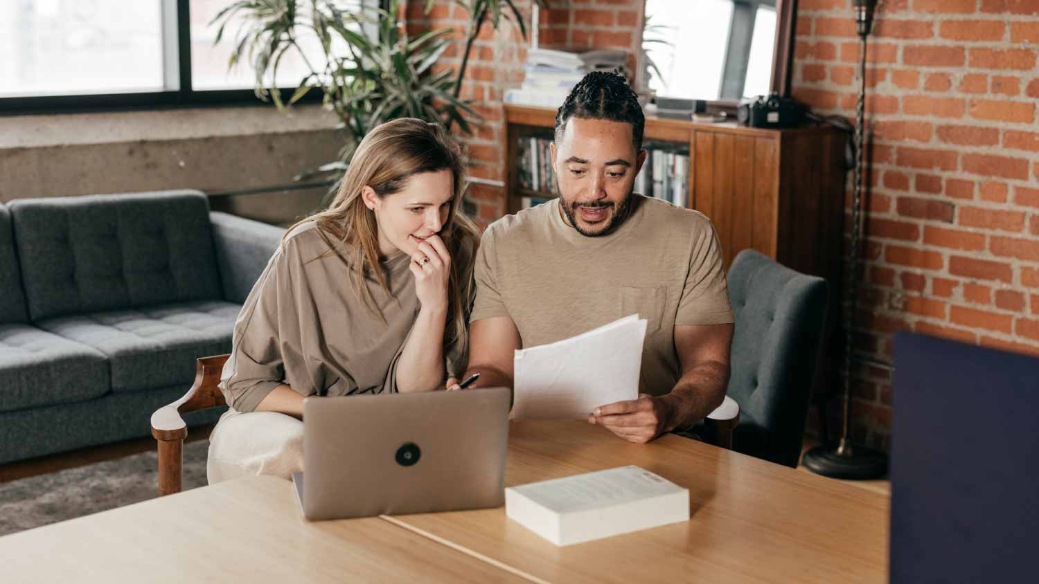 Couple checking a financial plan